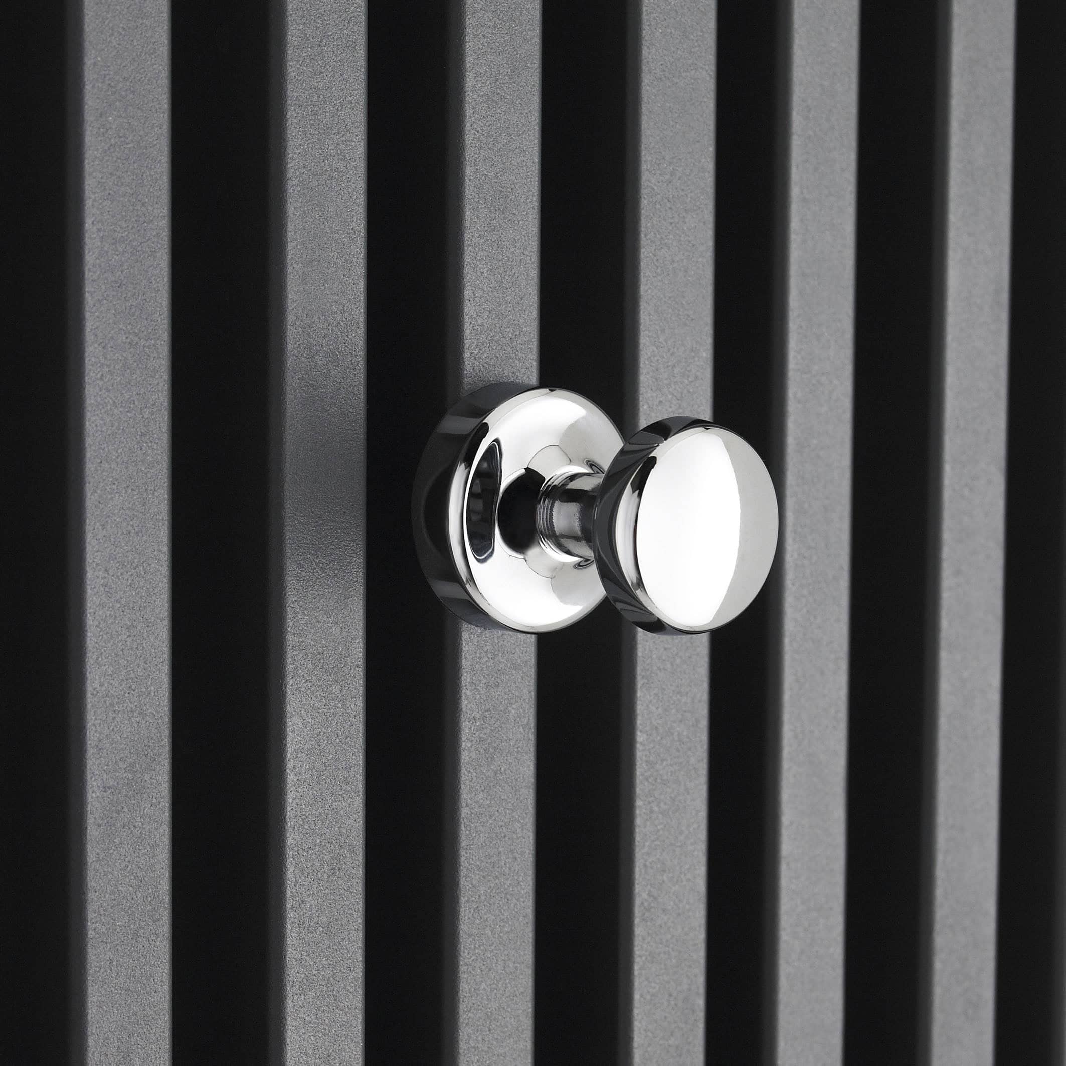 Chrome towel hook on black slatted wall, modern bathroom accessories, sleek and durable bathroom hardware, stylish chrome finish.