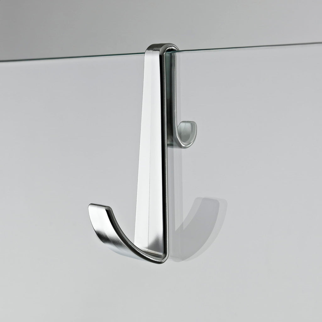 Modern glass shower door with sleek chrome handle for contemporary bathroom design.