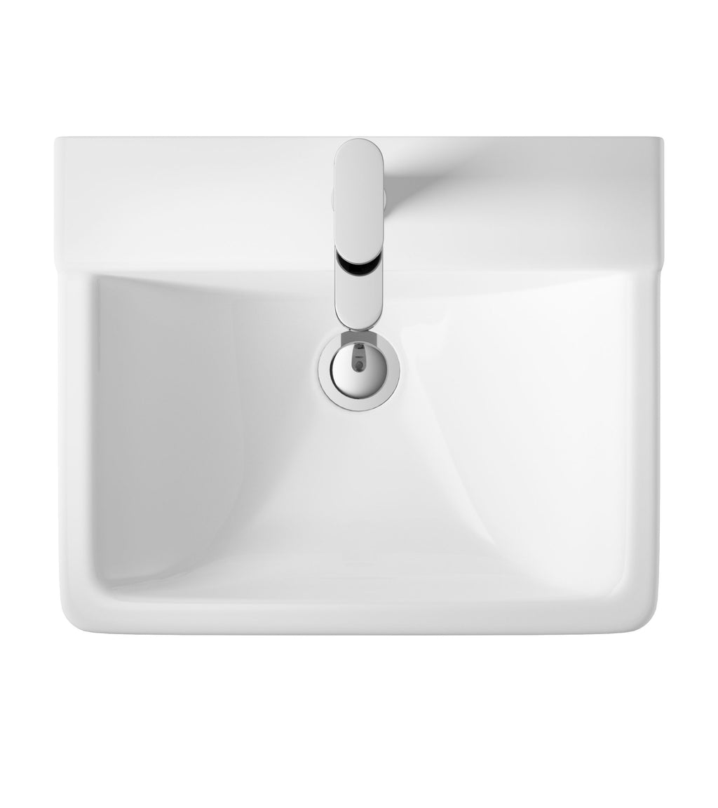 Shallow rectangular white bathroom sink with chrome-finished faucet and overflow hole, designed for modern bathrooms and durable use.