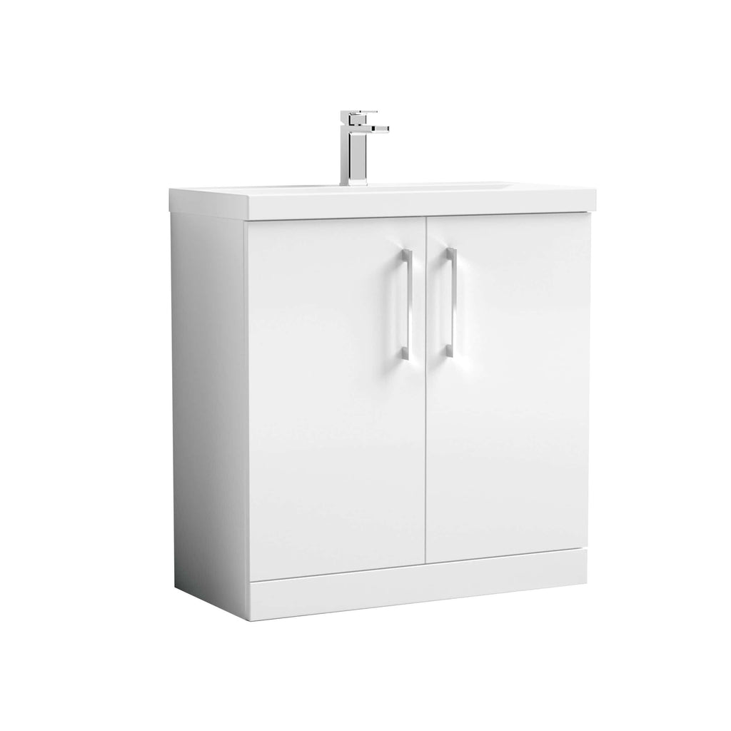 White bathroom vanity with integrated sink and modern chrome faucet, ideal for contemporary en-suite or small bathroom setups. Crafted for style and practicality.