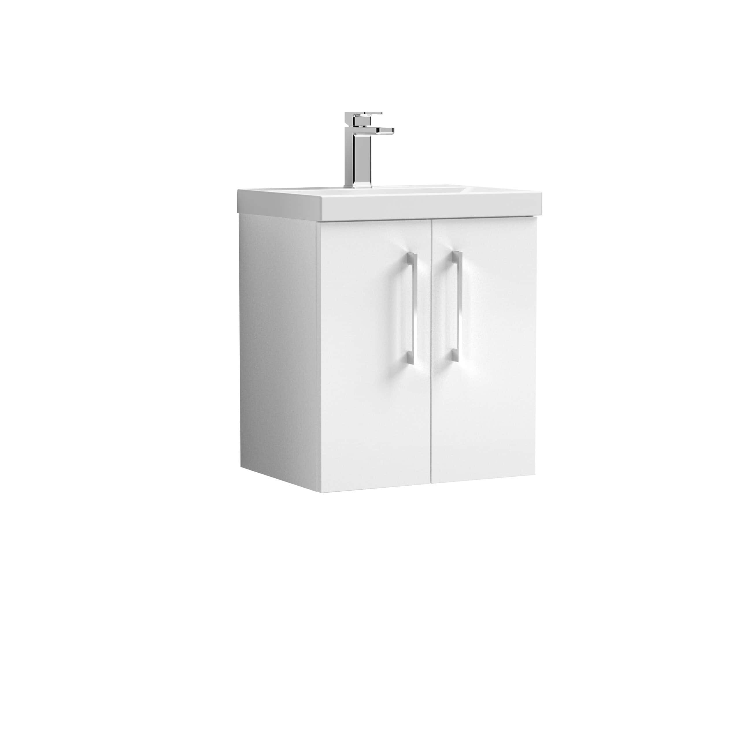 Modern white bathroom vanity with integrated sink and sleek chrome tap for contemporary bathroom designs. Perfect for small spaces or minimalist aesthetics.