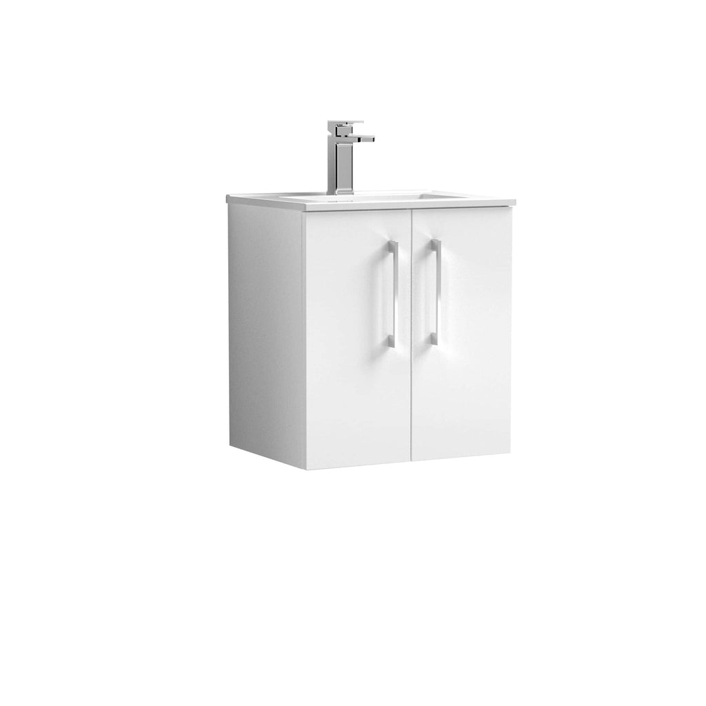 Modern white bathroom vanity with integrated sink and chrome faucet, ideal for contemporary bathroom designs. Durable cabinetry with two handles for ample storage; perfect for small to medium bathrooms.