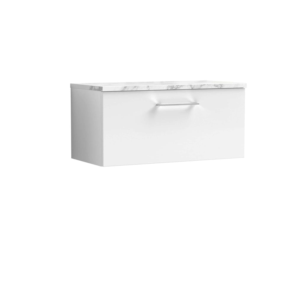Sleek white bathroom vanity with marble countertop and modern handle, ideal for contemporary bathroom designs.