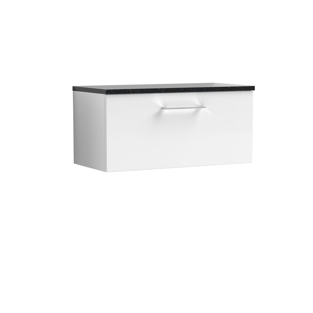 Modern white bathroom vanity with a black speckled countertop and sleek handle, ideal for contemporary bathroom storage and style.