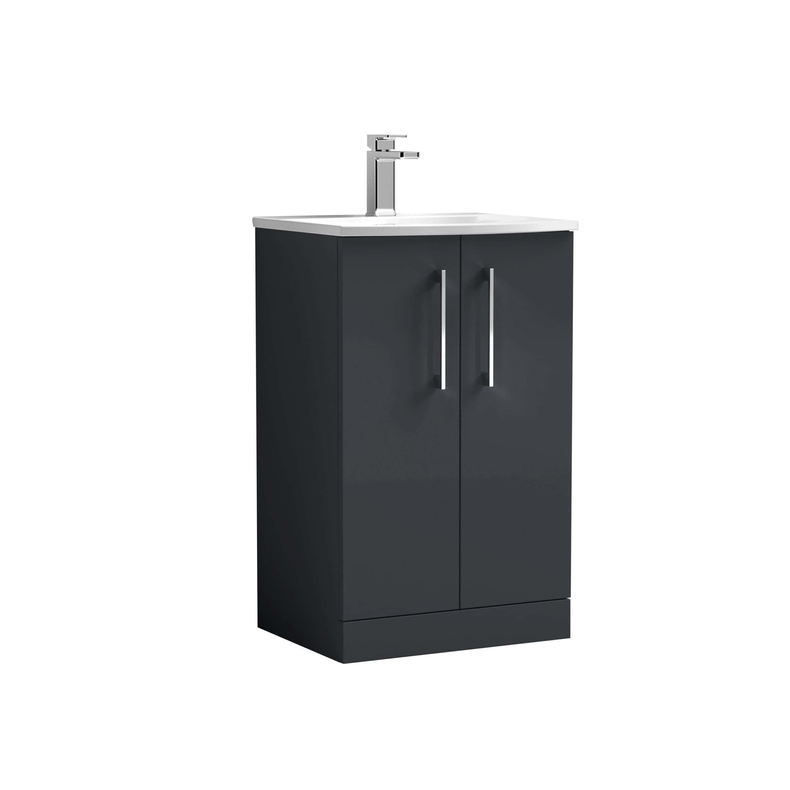 Modern black bathroom vanity with integrated sink and chrome tap, ideal for contemporary bathroom designs and efficient space utilisation.