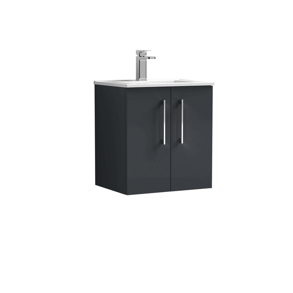 Sleek black bathroom vanity unit with white top and modern chrome handle, ideal for contemporary bathroom interiors, featuring storage space and a stylish basin with a chrome tap.