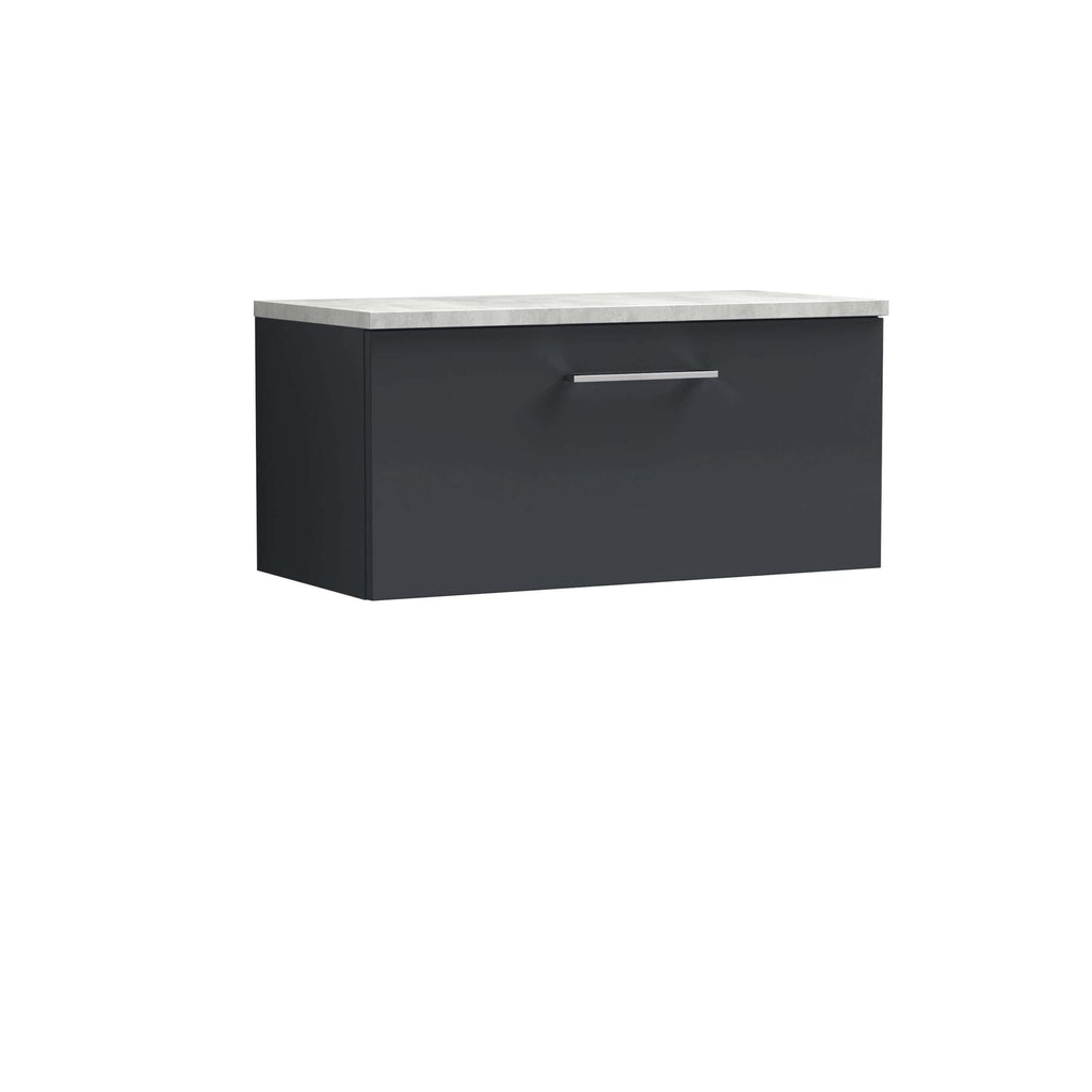 Sleek black bathroom vanity with a white marble countertop and modern silver handle, perfect for contemporary bathroom decor and storage solutions.