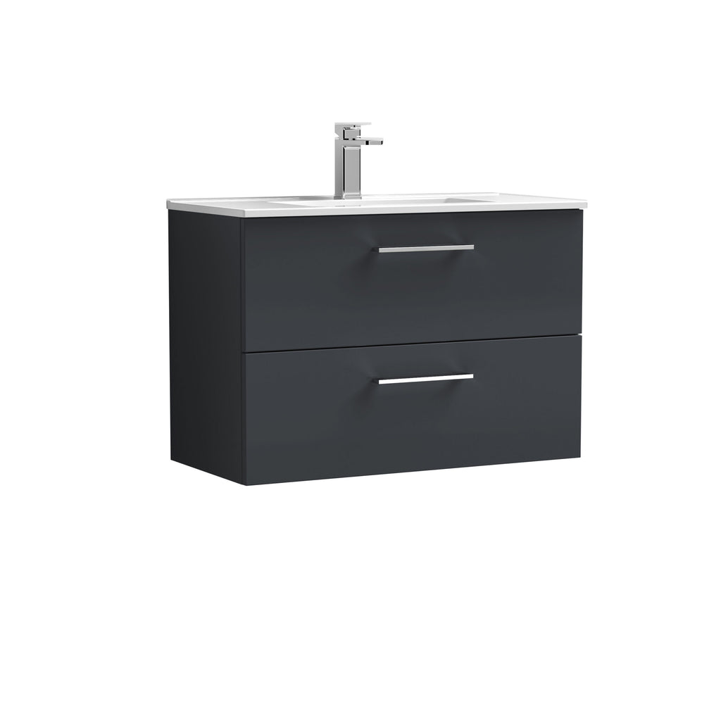 Modern black bathroom vanity with integrated sink and chrome handles, designed for stylish and functional bathroom storage solutions.