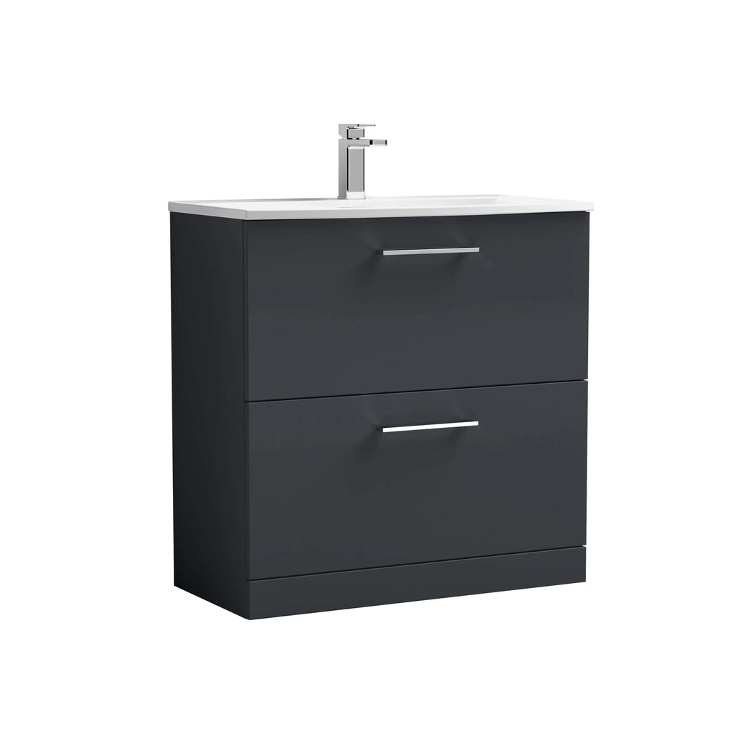 Modern bathroom vanity unit with a sleek dark grey finish and integrated handles, featuring a white countertop and chrome tap for contemporary bathroom design.