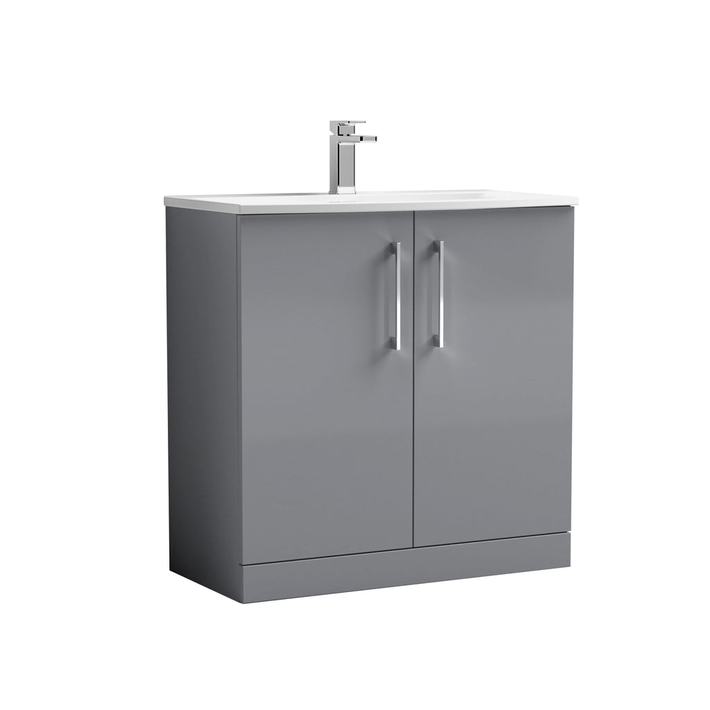Modern grey bathroom vanity with integrated sink and chrome faucet, ideal for contemporary bathroom designs.