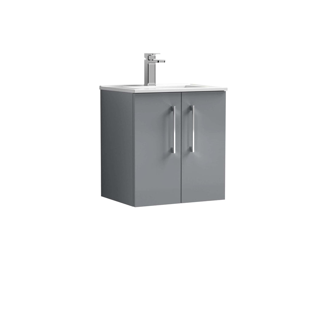 Modern grey bathroom vanity unit with a sleek white countertop and chrome faucet, perfect for contemporary bathroom designs and storage.