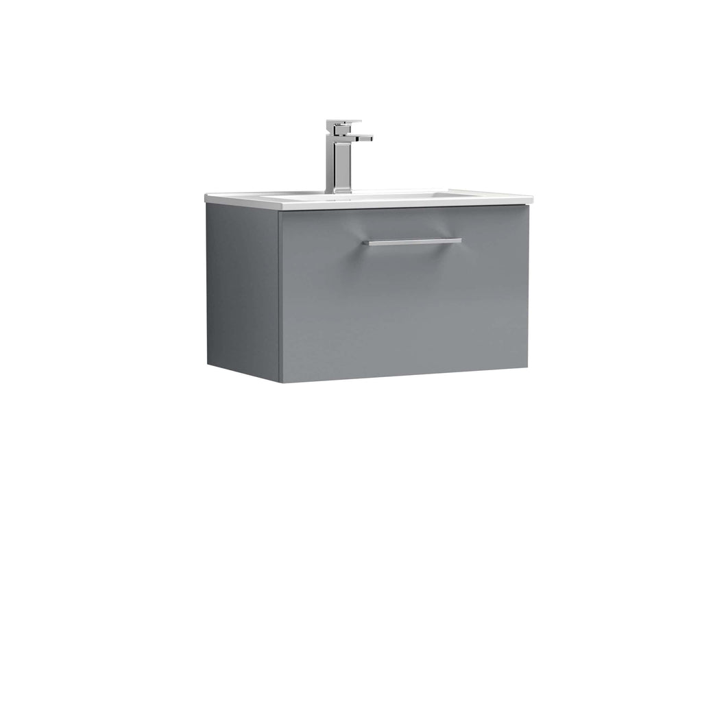 Modern grey bathroom sink vanity with a sleek design and chrome tap, ideal for contemporary bathroom decor and space-saving solutions.
