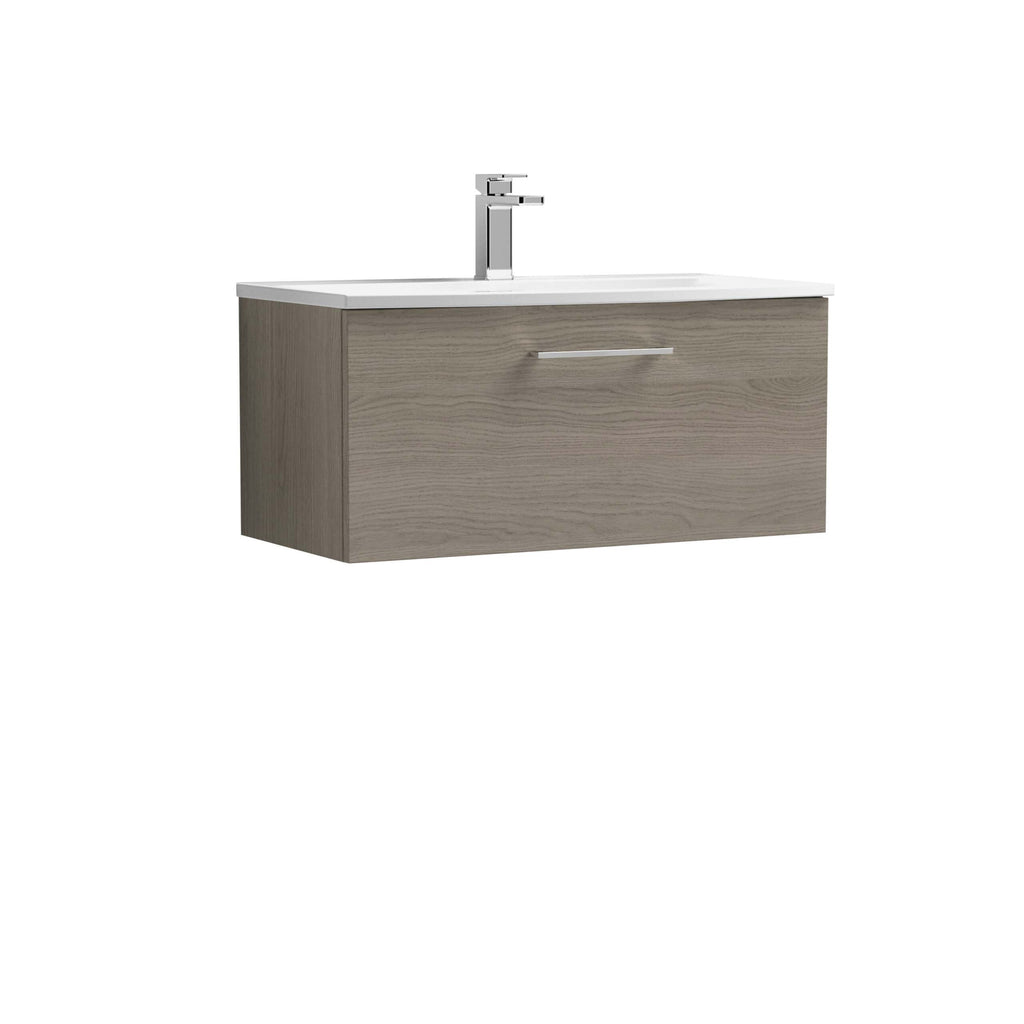Modern beige bathroom vanity with integrated sink and sleek chrome handle, ideal for contemporary bathroom designs.
