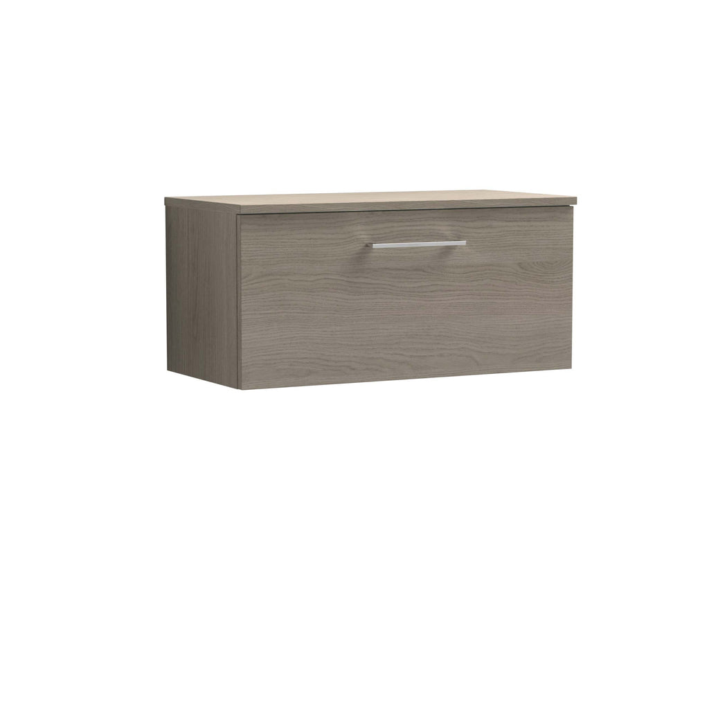 Sleek modern wall-mounted bathroom storage cabinet in light oak finish with a single handle drawer, ideal for contemporary bathrooms. Perfect for organised and stylish bathroom environments.