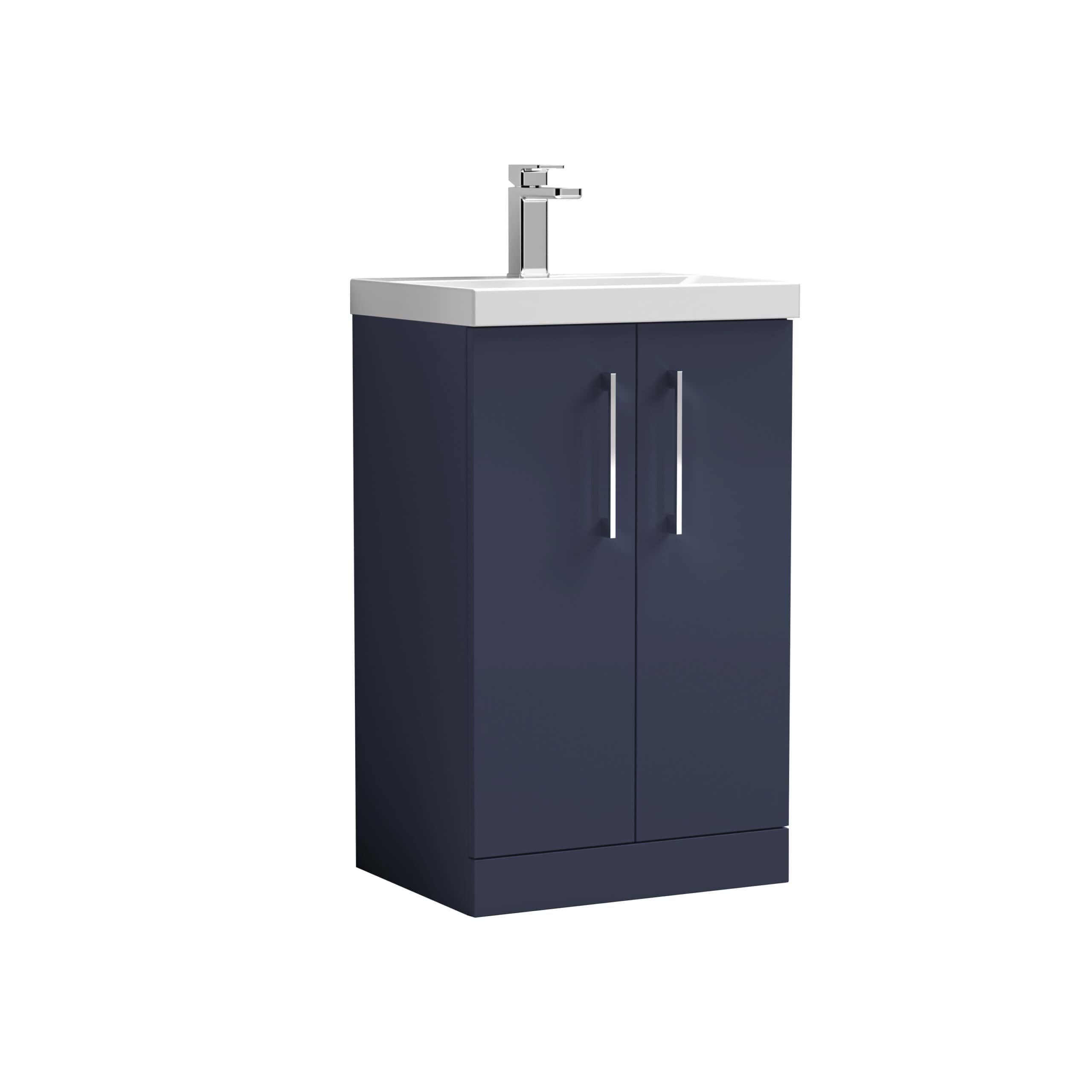 Sleek navy bathroom vanity unit with integrated sink and modern chrome handles, perfect for contemporary bathroom design. Durable waterproof finish for long-lasting use and easy cleaning.