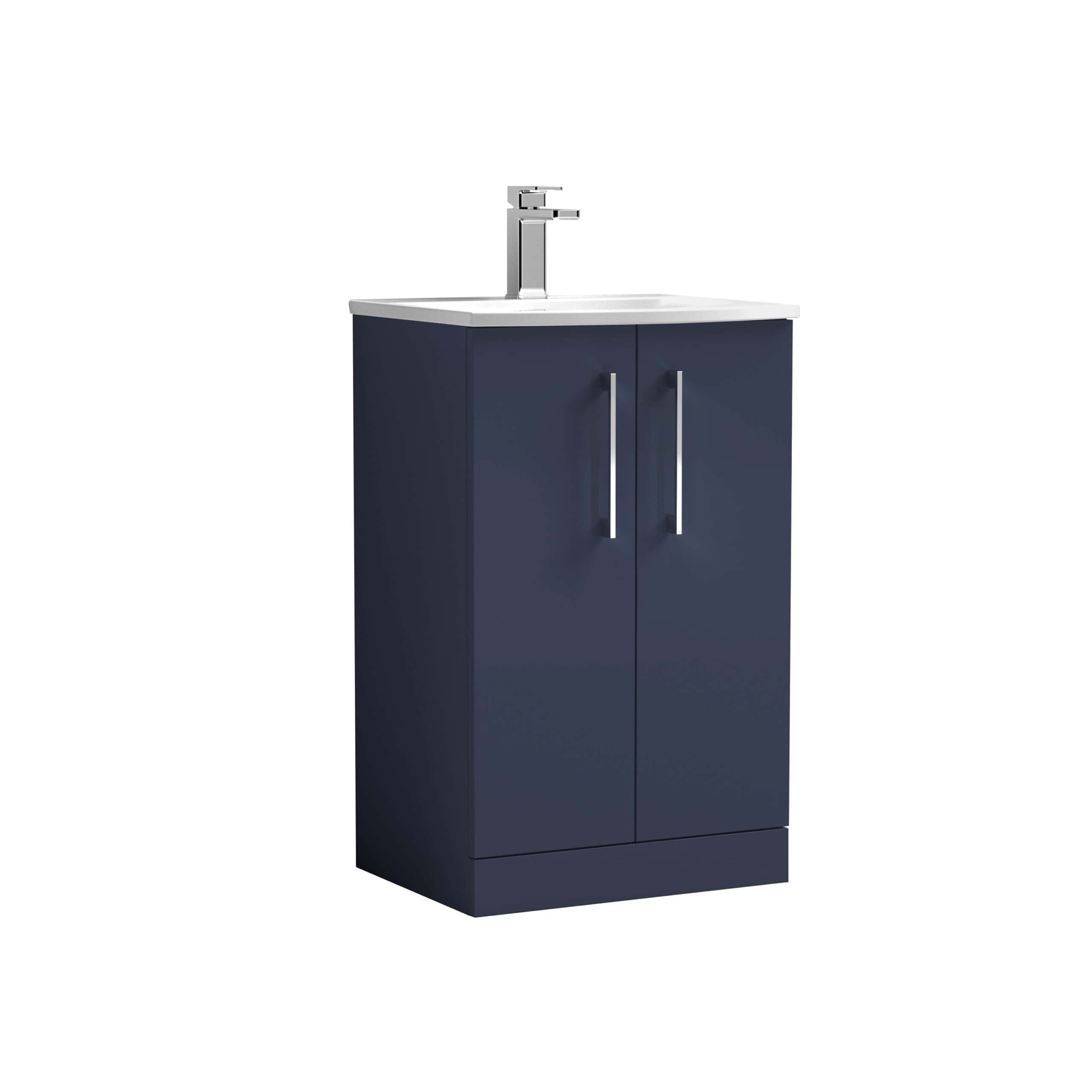 Sleek navy blue bathroom vanity with integrated white countertop and modern chrome handle, ideal for contemporary bathroom designs.