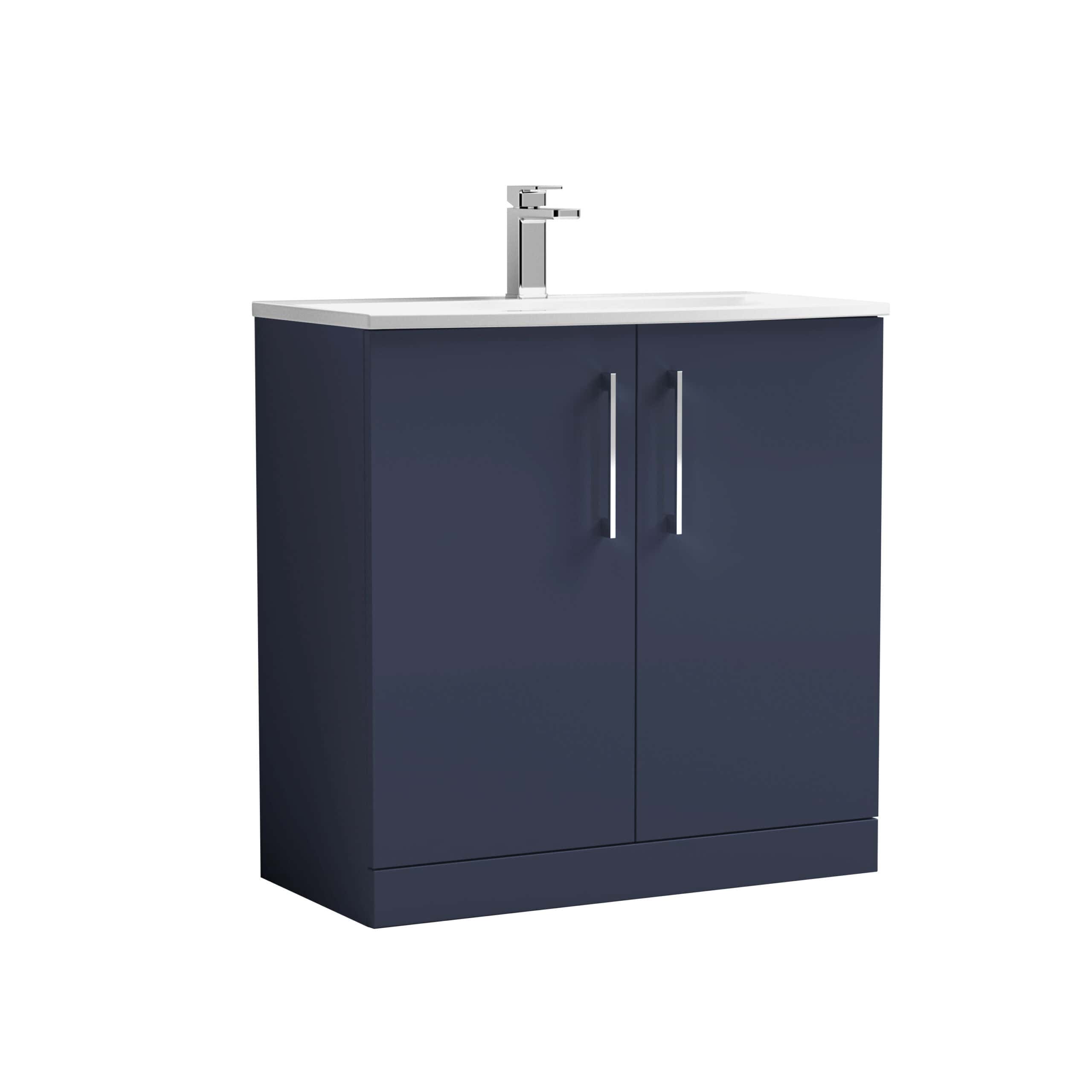 Modern navy bathroom vanity cabinet with white countertop and chrome faucet, perfect for contemporary bathroom design and storage solutions.