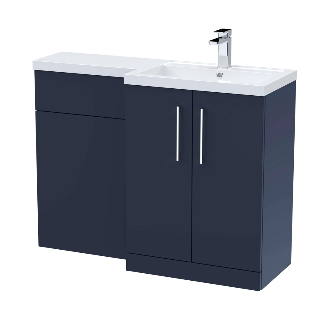 Modern bathroom vanity with navy blue cabinets and white countertop, integrated sink, and chrome faucet, ideal for contemporary bathroom designs.