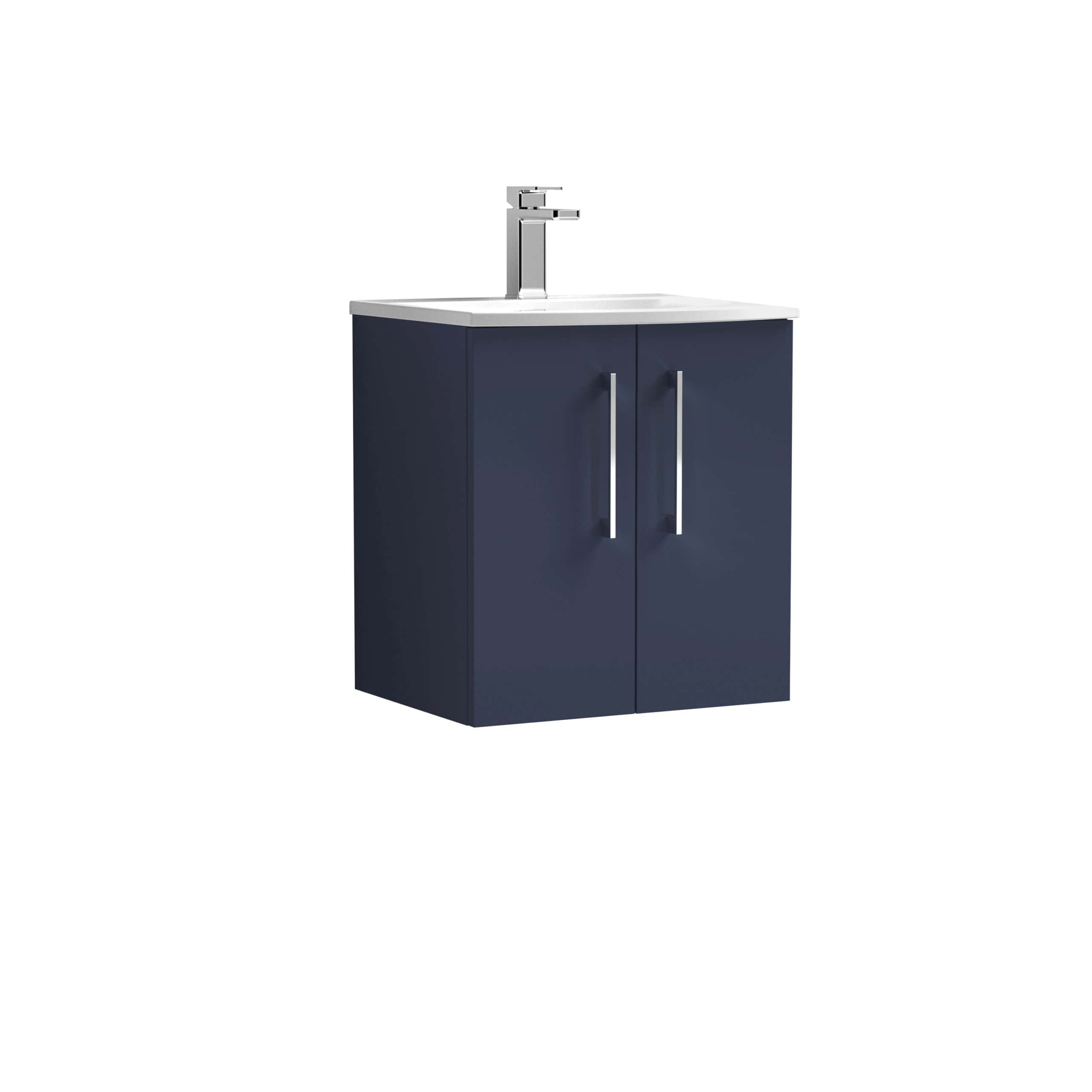 Compact blue bathroom vanity with integrated sink and modern chrome tap, ideal for small bathroom spaces and contemporary interior designs.