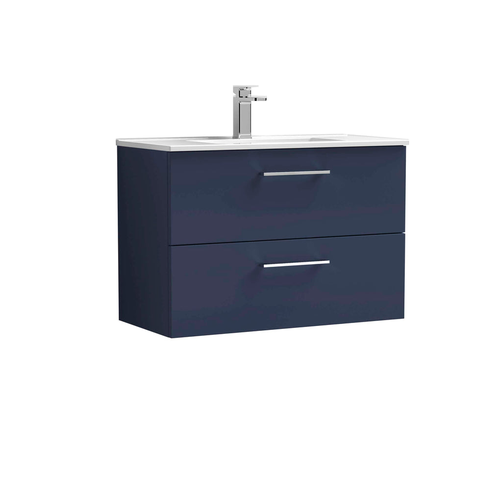 Modern navy blue bathroom vanity with integrated sink and chrome faucet, ideal for contemporary bathroom designs, providing stylish storage solutions and sleek aesthetics.