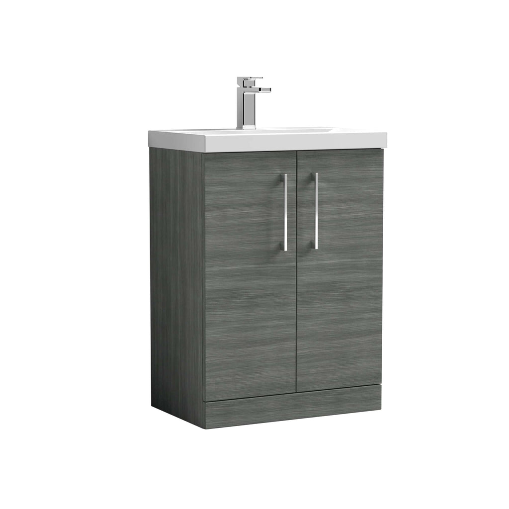 Small bathroom vanity unit with integrated sink and chrome tap, grey wood-effect finish, ideal for compact bathrooms and bathroom renovations.