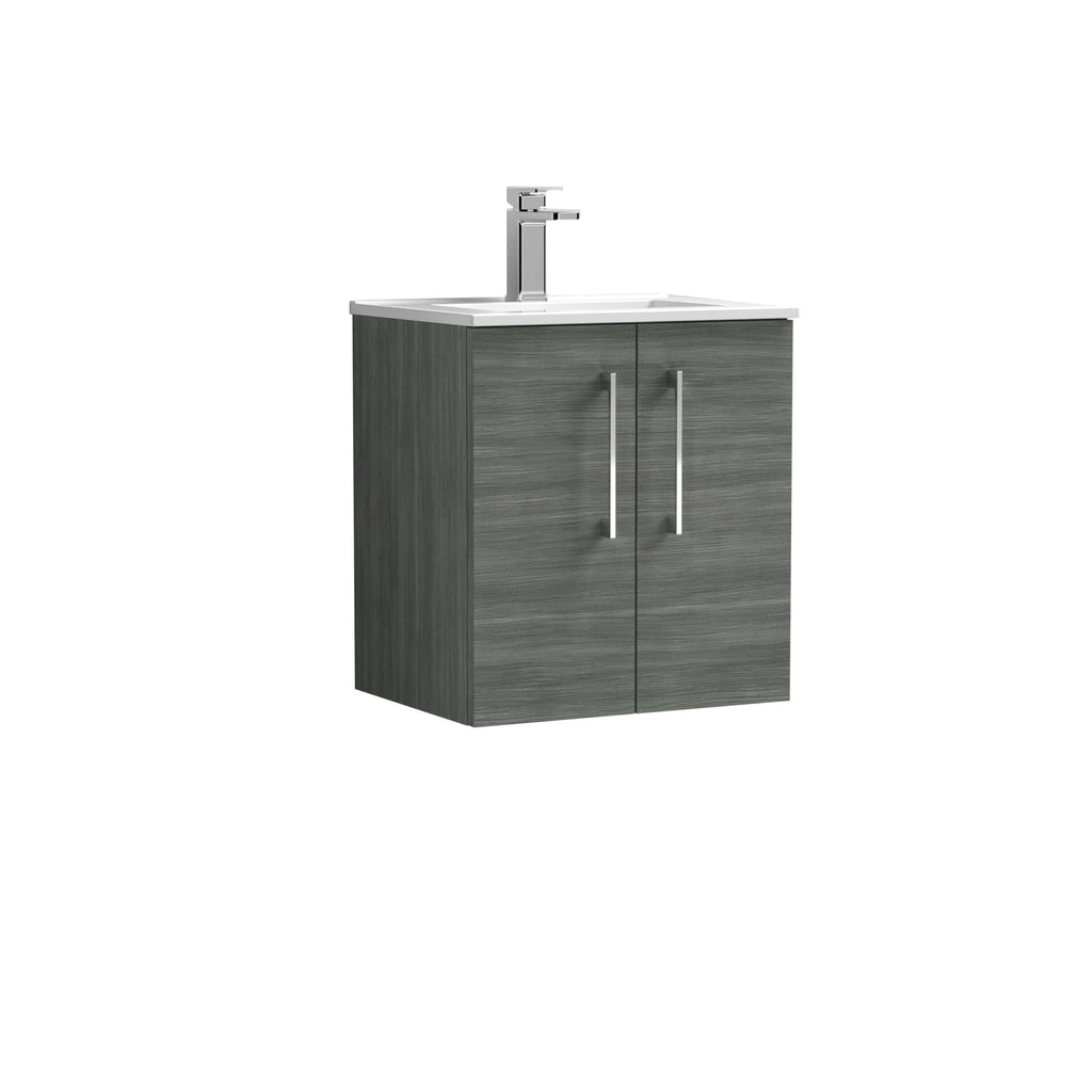 Modern grey bathroom vanity unit with integrated ceramic sink and chrome tap for stylish bathroom storage solutions.