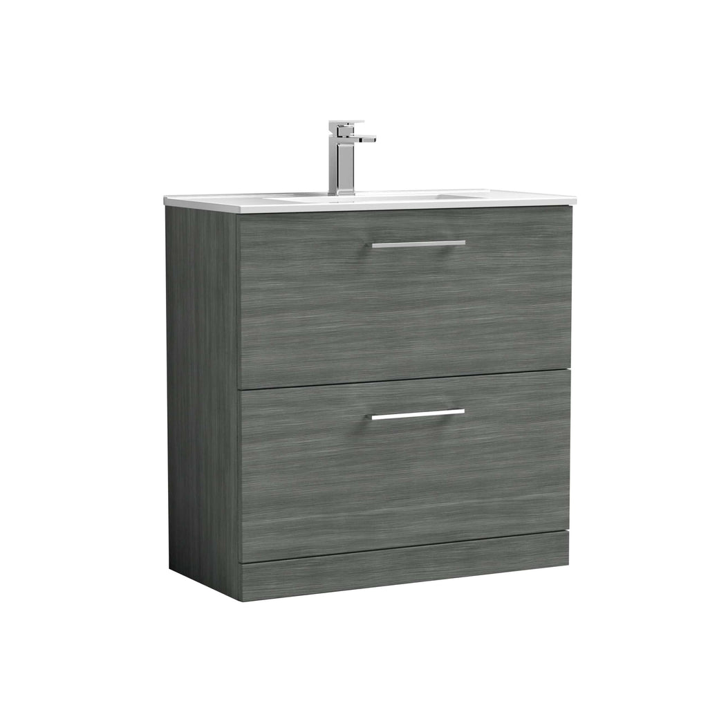 Modern grey bathroom vanity with integrated sink and chrome handle taps, ideal for contemporary bathroom designs and storage.