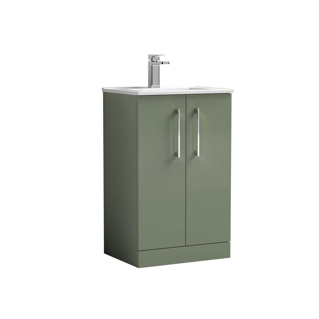 Sustainable green bathroom vanity with integrated sink and modern chrome tap, ideal for contemporary bathroom designs, offering stylish storage and functional space.