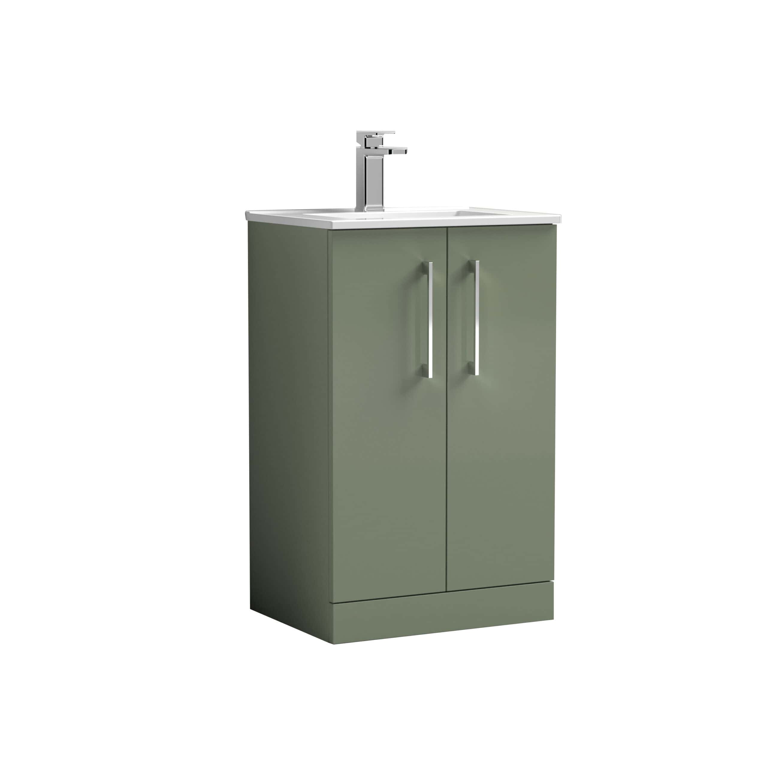 Sustainable green bathroom vanity with integrated sink and modern chrome tap, ideal for contemporary bathroom designs, offering stylish storage and functional space.
