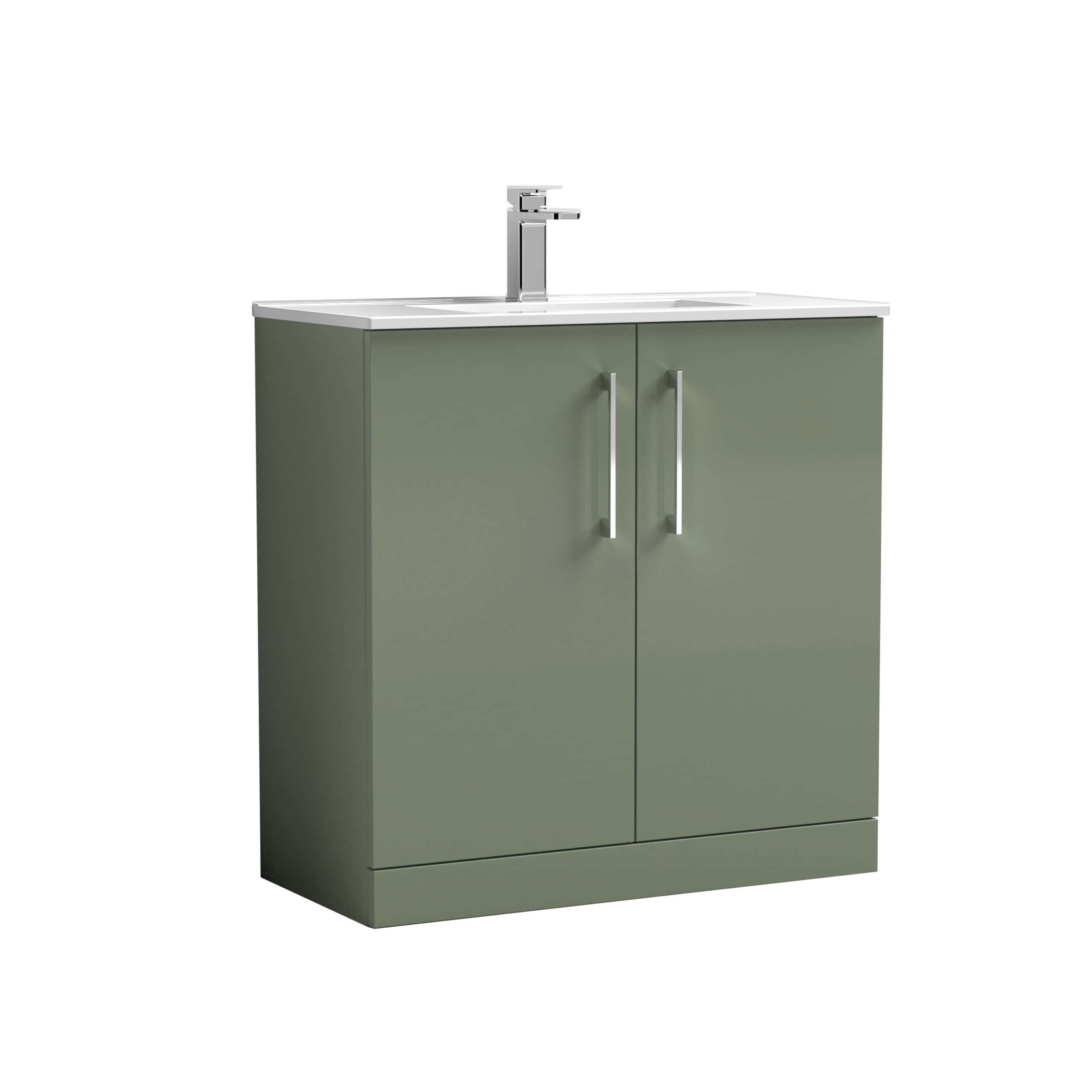 Sleek bathroom vanity unit with a green finish, double doors, and a modern chrome handle, designed for contemporary bathrooms. Features a white countertop and integrated sink with a chrome faucet.