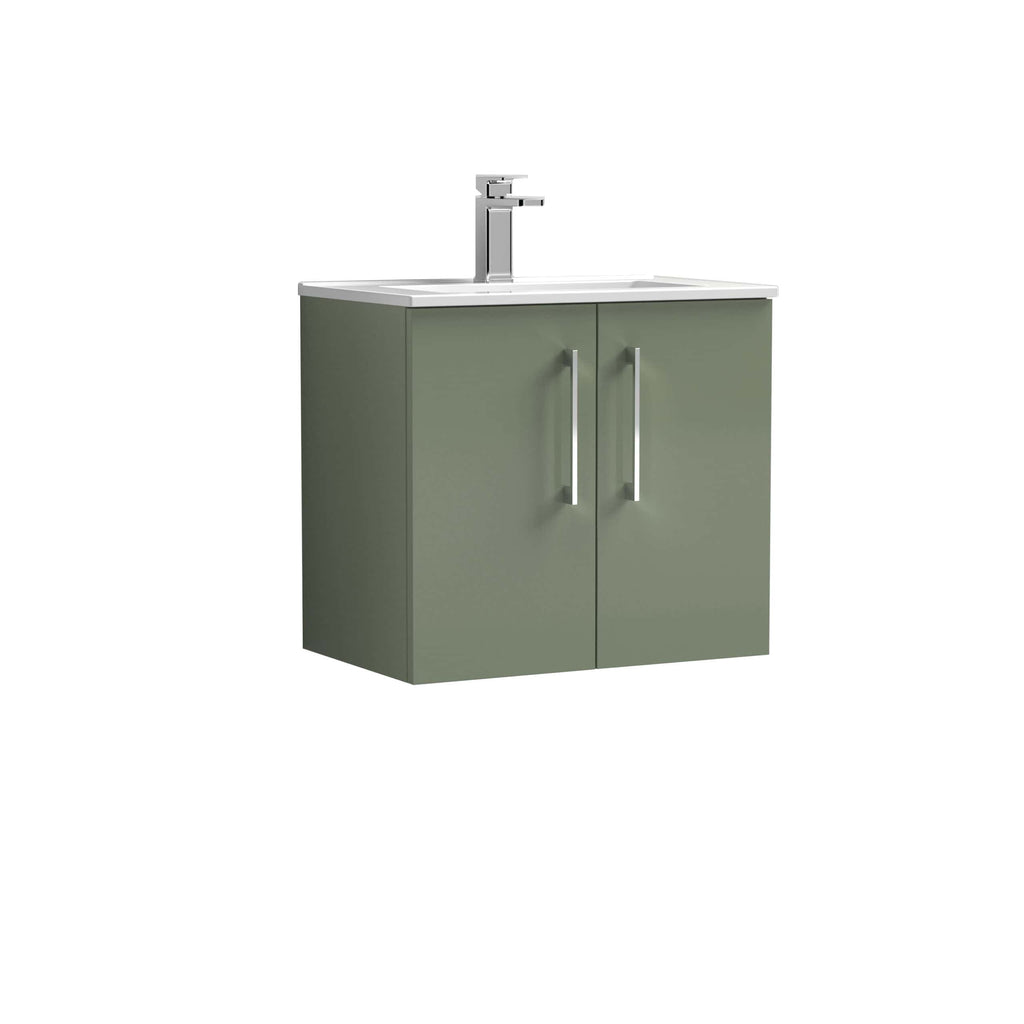 Modern green bathroom vanity with white sink and chrome faucet, ideal for contemporary bathroom designs. Durable cabinetry with sleek metallic handles, perfect for storage and style.