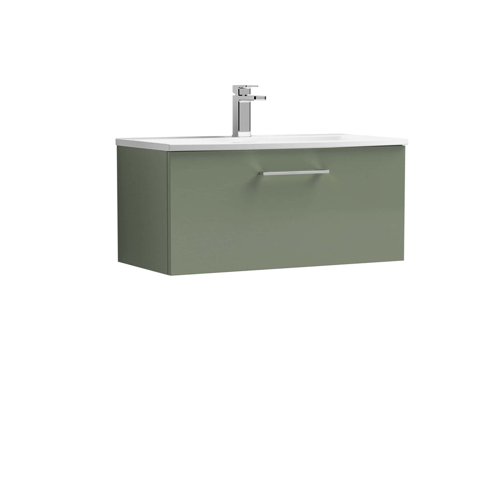 Matt green bathroom vanity with integrated sink and modern chrome faucet, ideal for contemporary bathroom design. Durable and stylish storage solution for bathroom organisation and aesthetics.