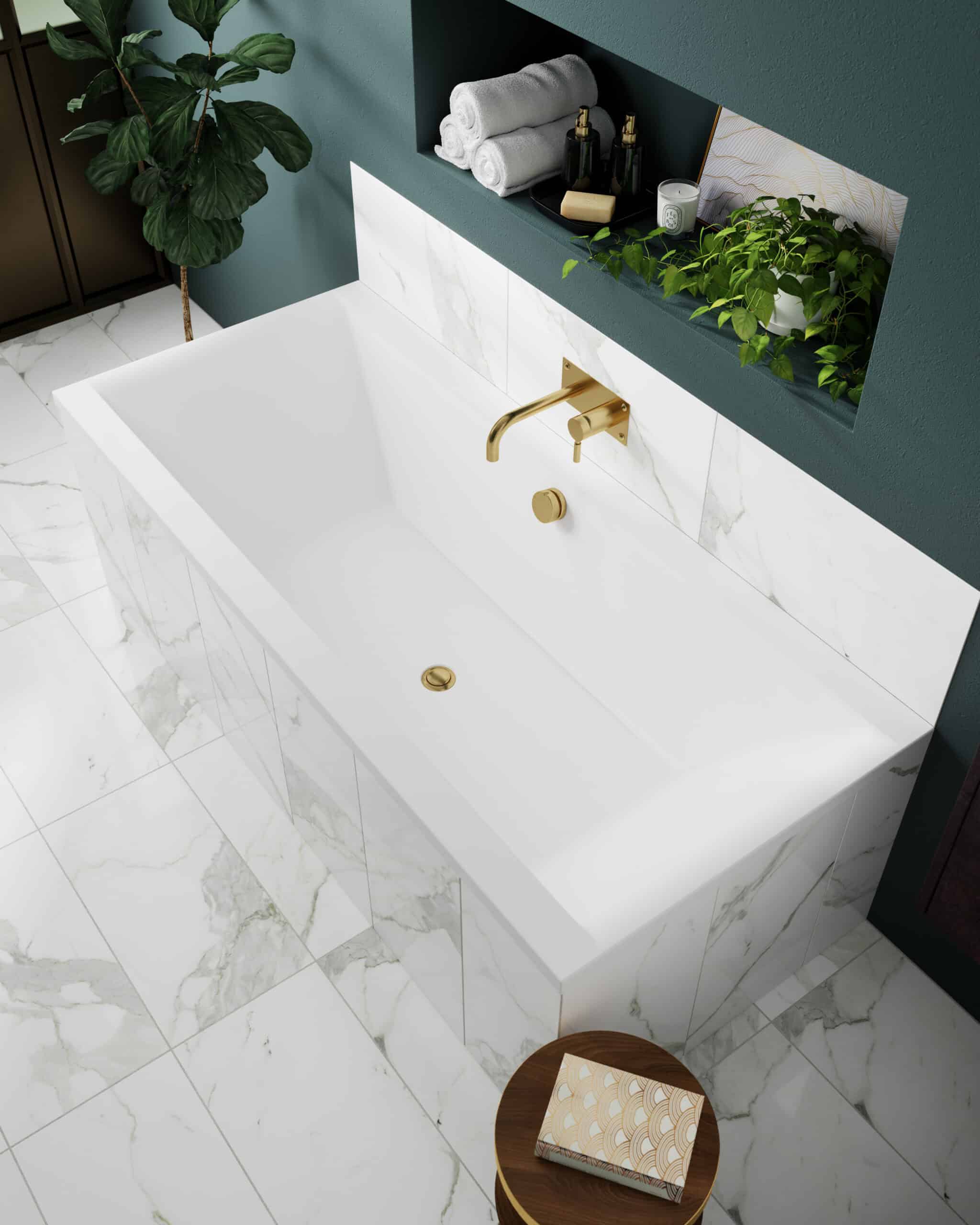 Sleek white freestanding bathtub with gold fixtures in modern bathroom, marble tiled floor and green decor, stylish and luxurious bathroom design, bubble.co.uk, Bubly Bathrooms.
