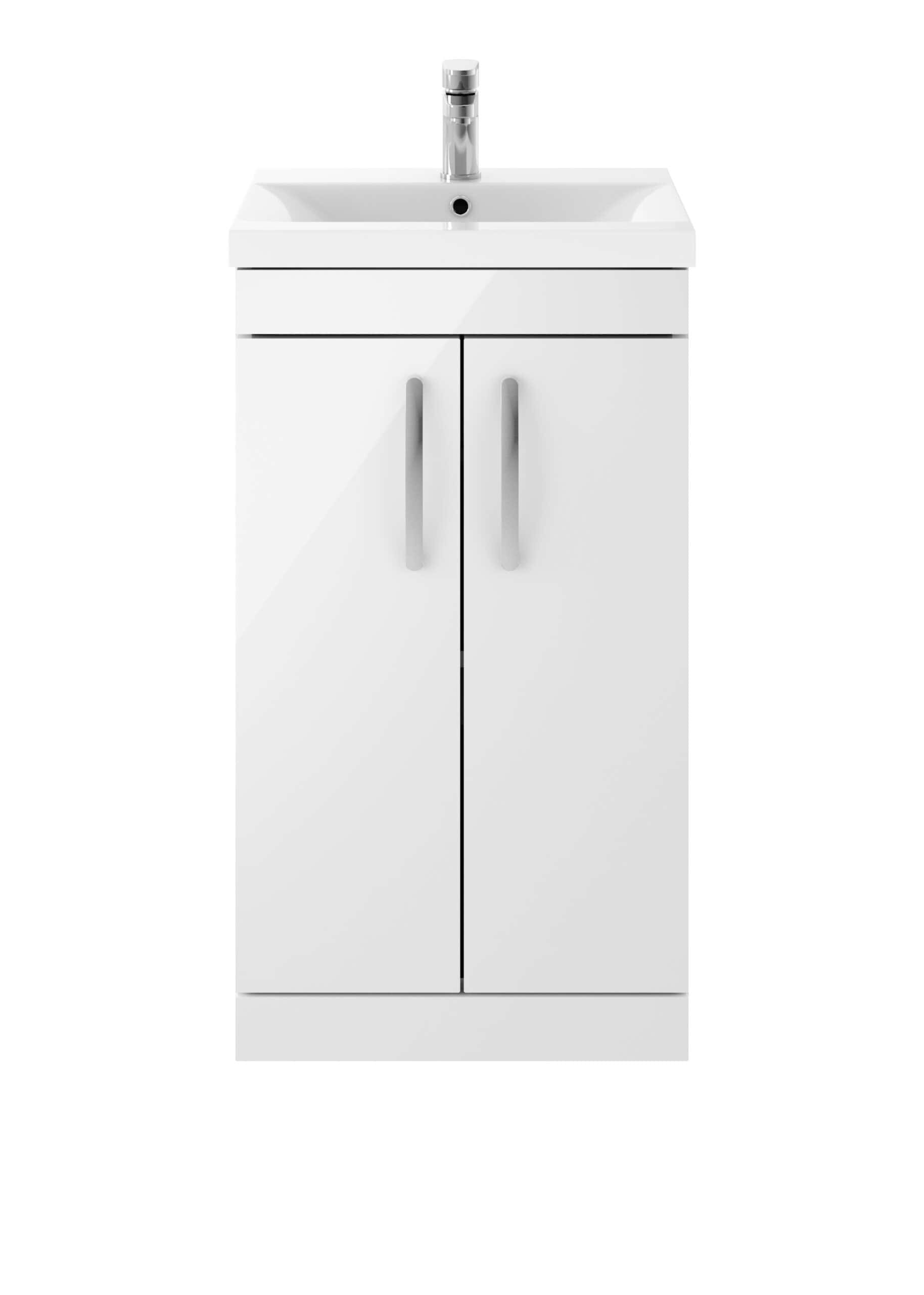 White bathroom vanity with integrated sink and chrome faucet, ideal for modern bathroom decor. Compact design offers ample storage with dual doors, perfect for bathroom organisation.