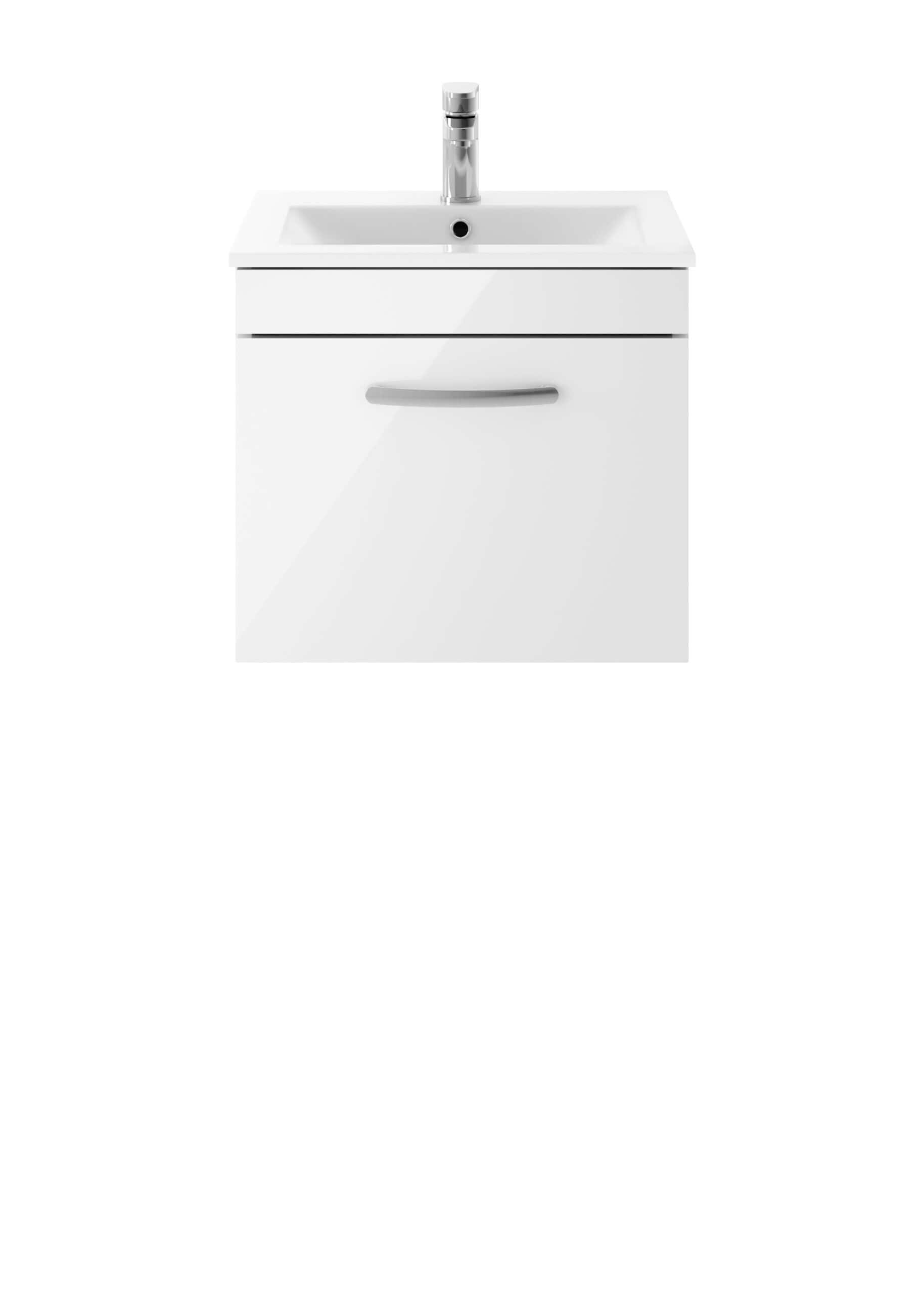 White bathroom sink vanity unit with a chrome-finished tap and sleek handle, perfect for modern bathroom designs, providing ample storage space.