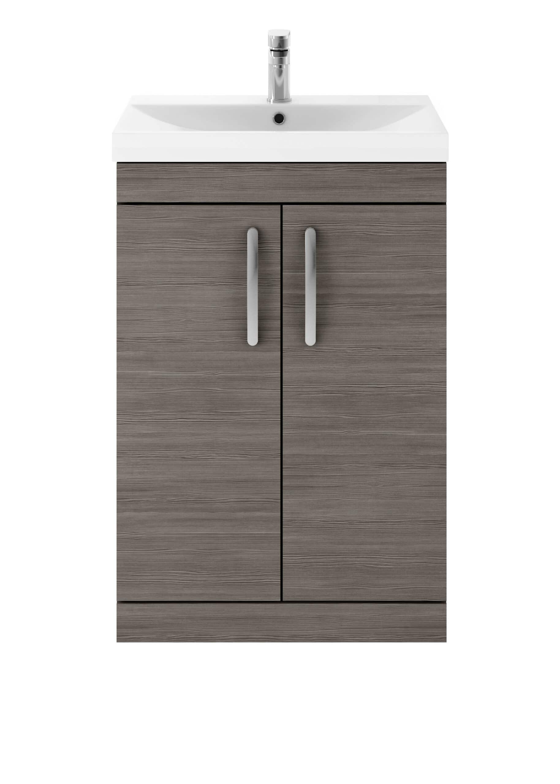 Modern bathroom vanity unit with a ceramic sink and chrome tap, featuring wood-effect finish cabinet doors for stylish bathroom storage.