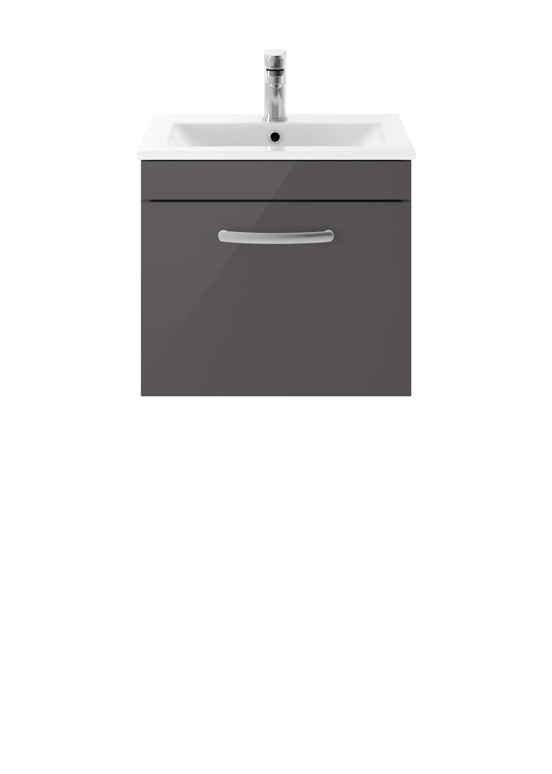 White bathroom sink with grey vanity unit, chrome handle, and modern faucet, ideal for bathroom furniture and fixtures.