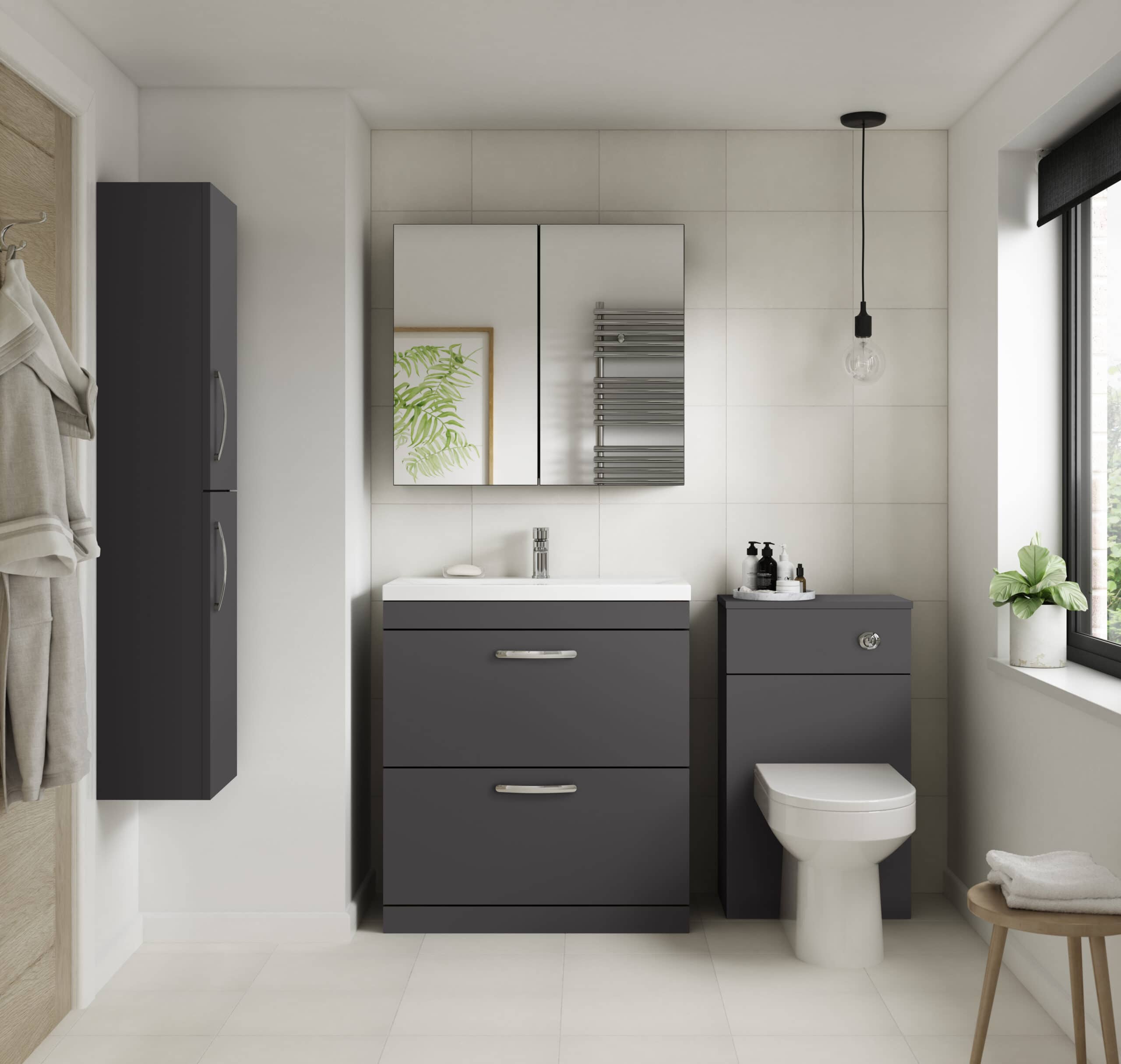 Sleek modern grey bathroom vanity and storage cabinets with white tile walls and contemporary fixtures, including a mirror and wall-mounted radiator, in a bright natural light bathroom setting.