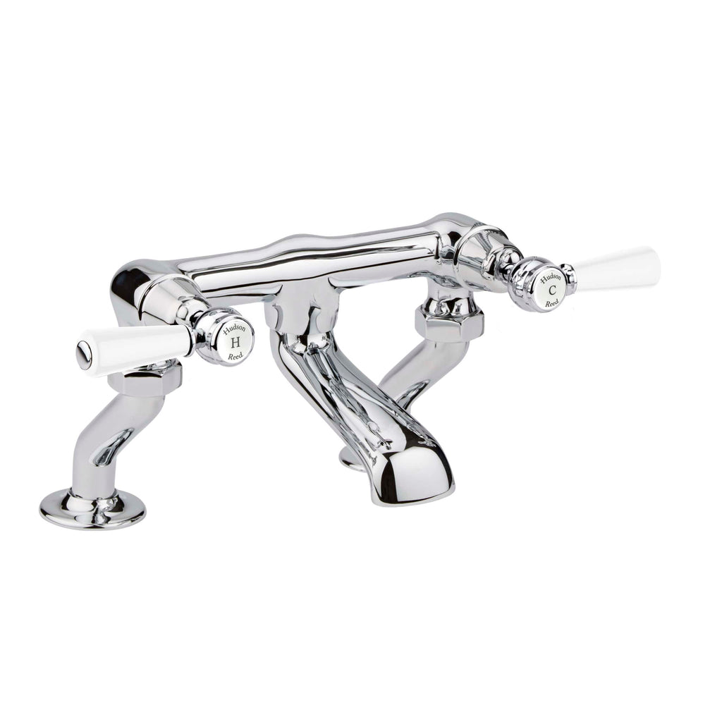Elegant chrome bathroom tap with vintage-style dual handles for hot and cold water, perfect for classic and traditional bathroom designs.