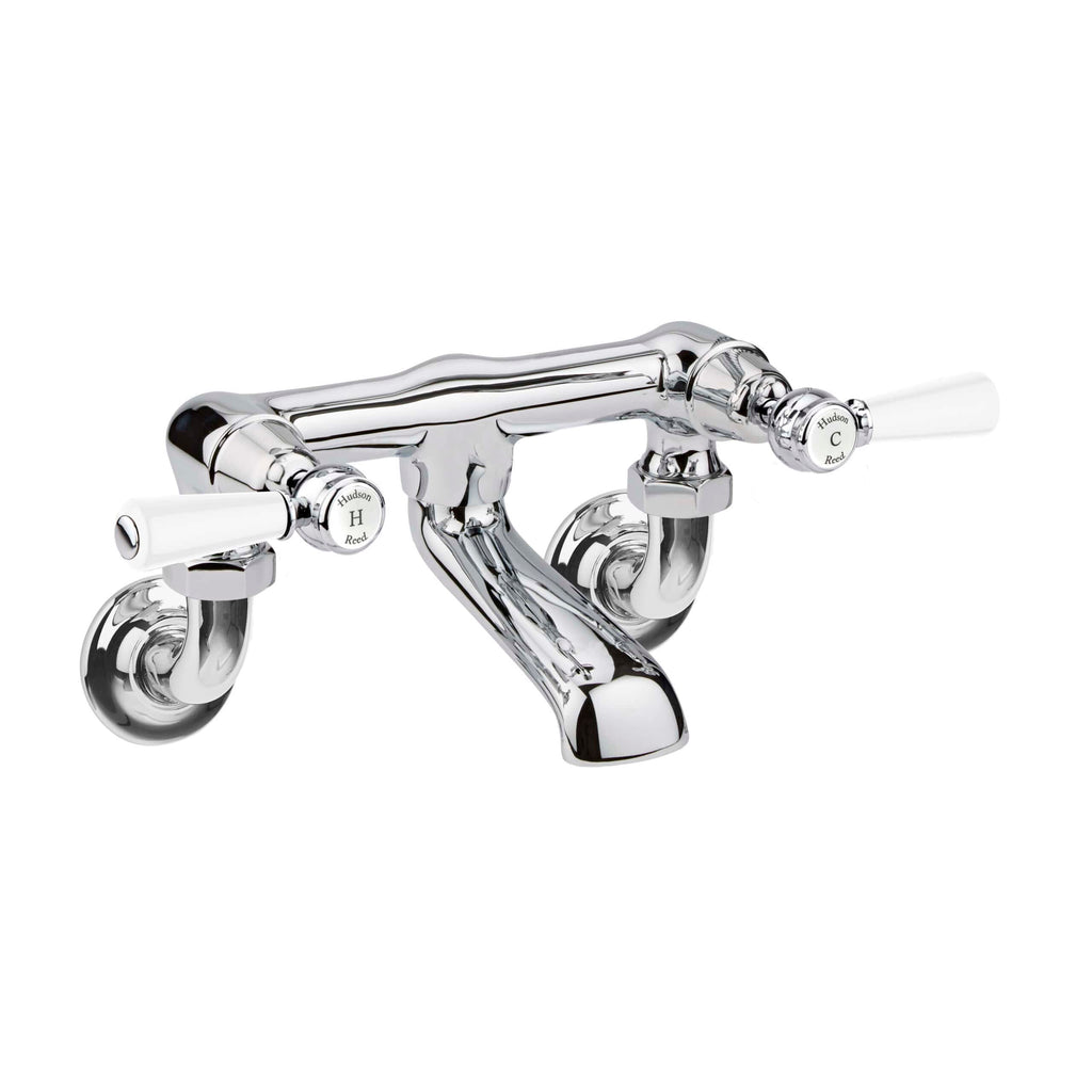 Brass vintage-style bath tap with dual handles, polished chrome finish, ideal for classic bathroom decor. Features traditional design and reliable craftsmanship for luxurious bath filling.