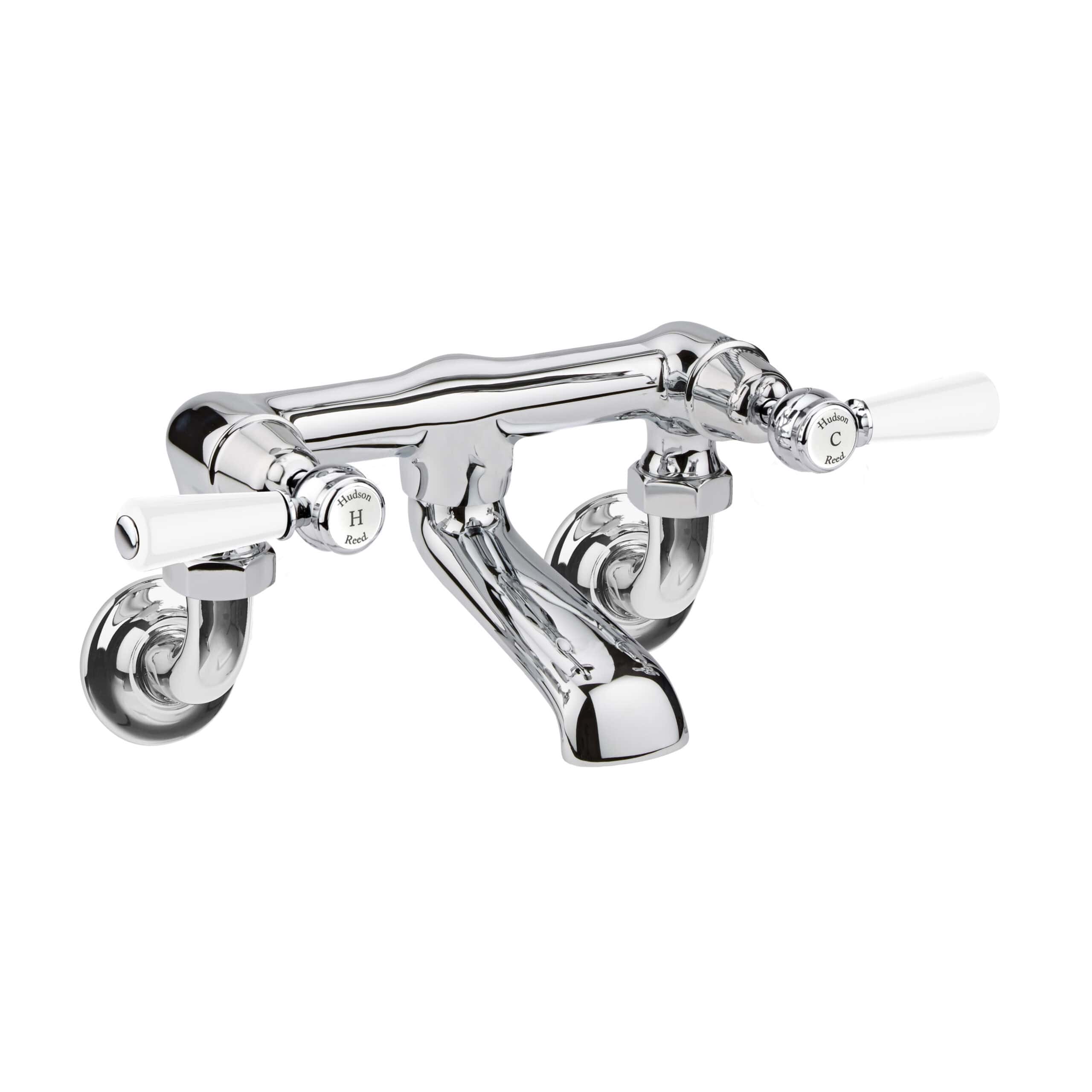 Brass vintage-style bath tap with dual handles, polished chrome finish, ideal for classic bathroom decor. Features traditional design and reliable craftsmanship for luxurious bath filling.