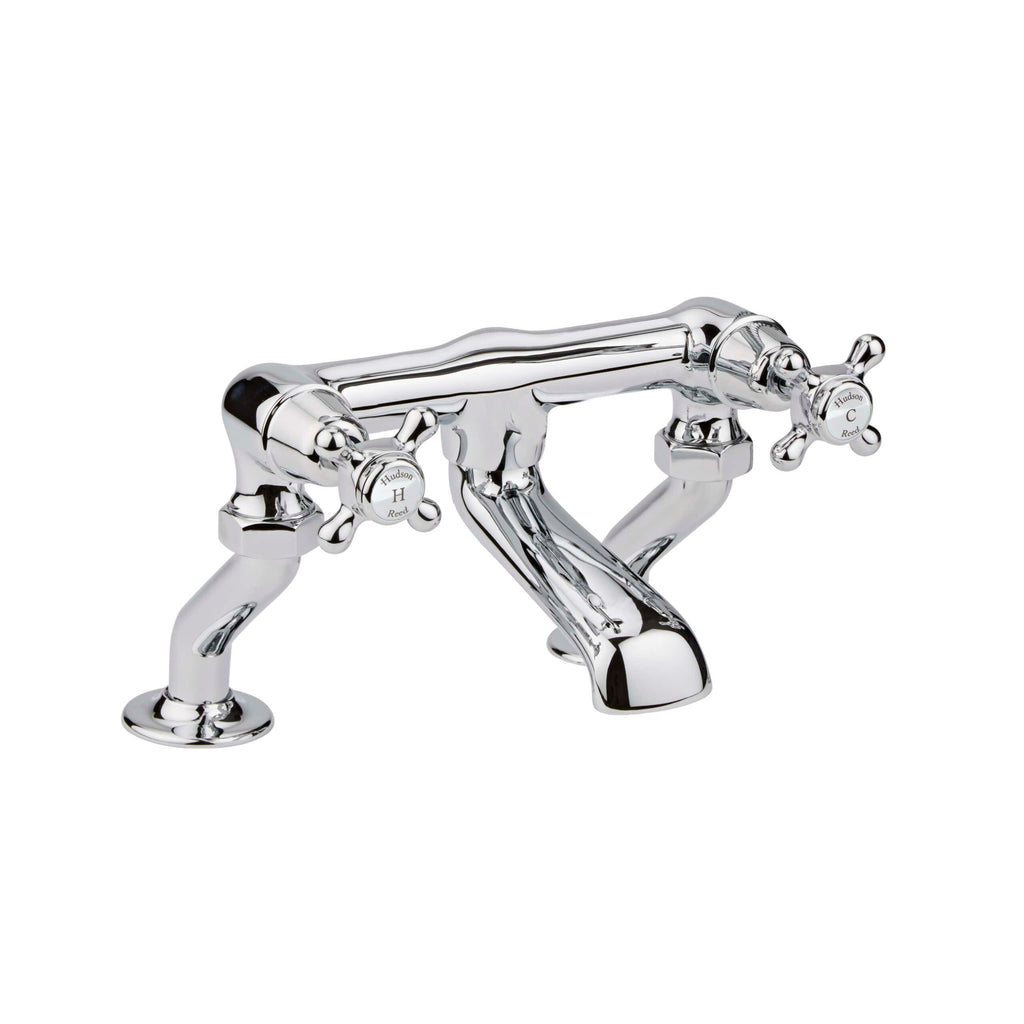 Shiny chrome bathroom sink tap with dual cross handles, vintage style, designed for classic bathroom aesthetics, easy to operate, high-quality plumbing fixture for stylish bathroom decor.