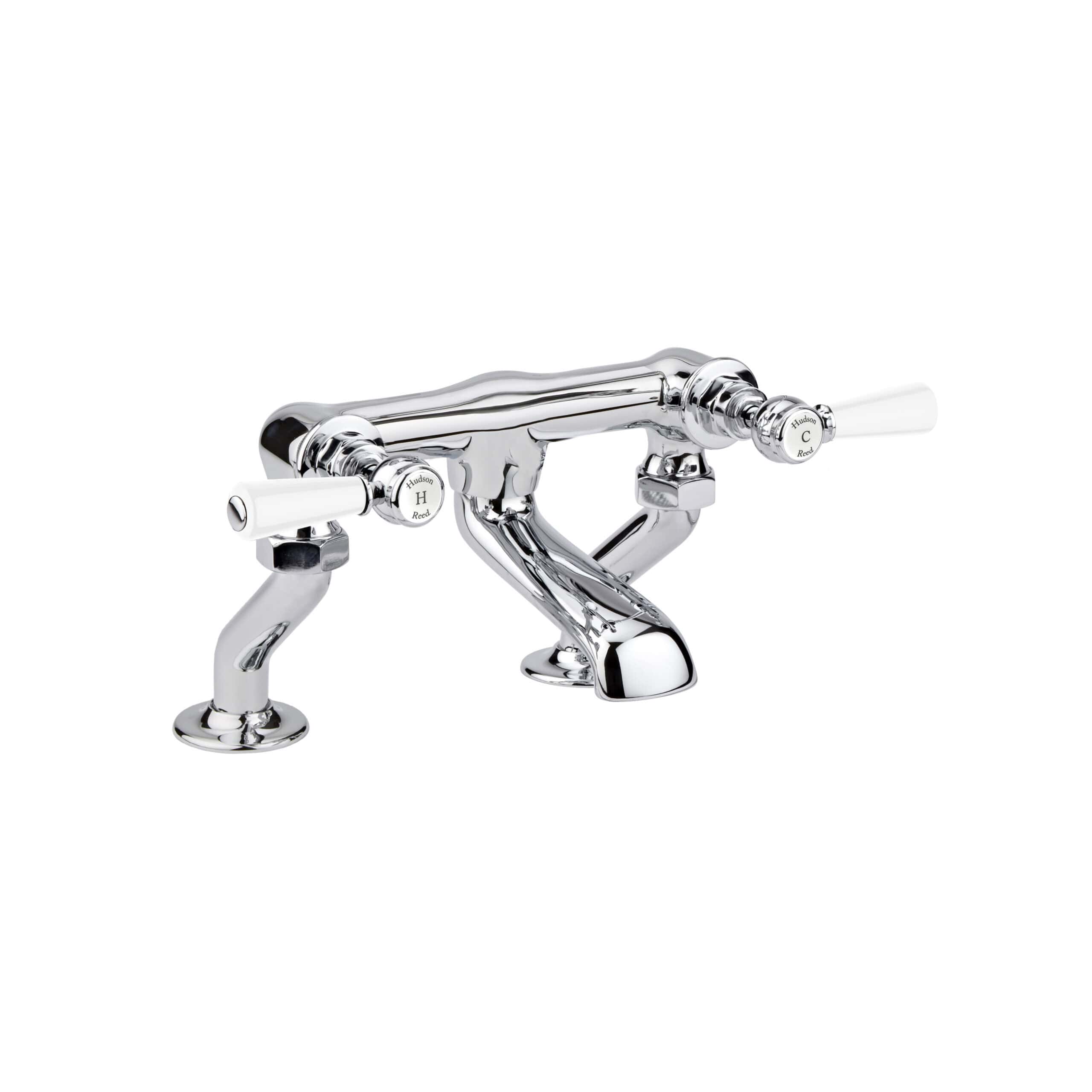 Shiny chrome bathroom sink tap with white handles, traditional design, includes dual control valves, ideal for classic or vintage style bathrooms. Perfect for modern bathroom fixtures.