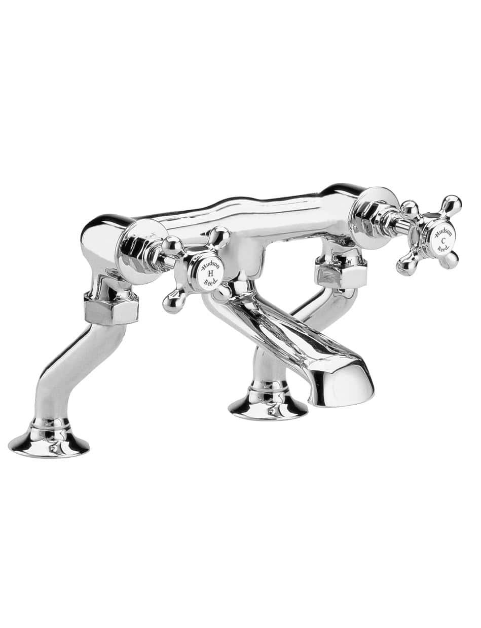 Chrome-plated vintage style bathroom tap with dual hot and cold controls, ideal for traditional bathroom decor. Durable and easy to operate with classic cross handles.