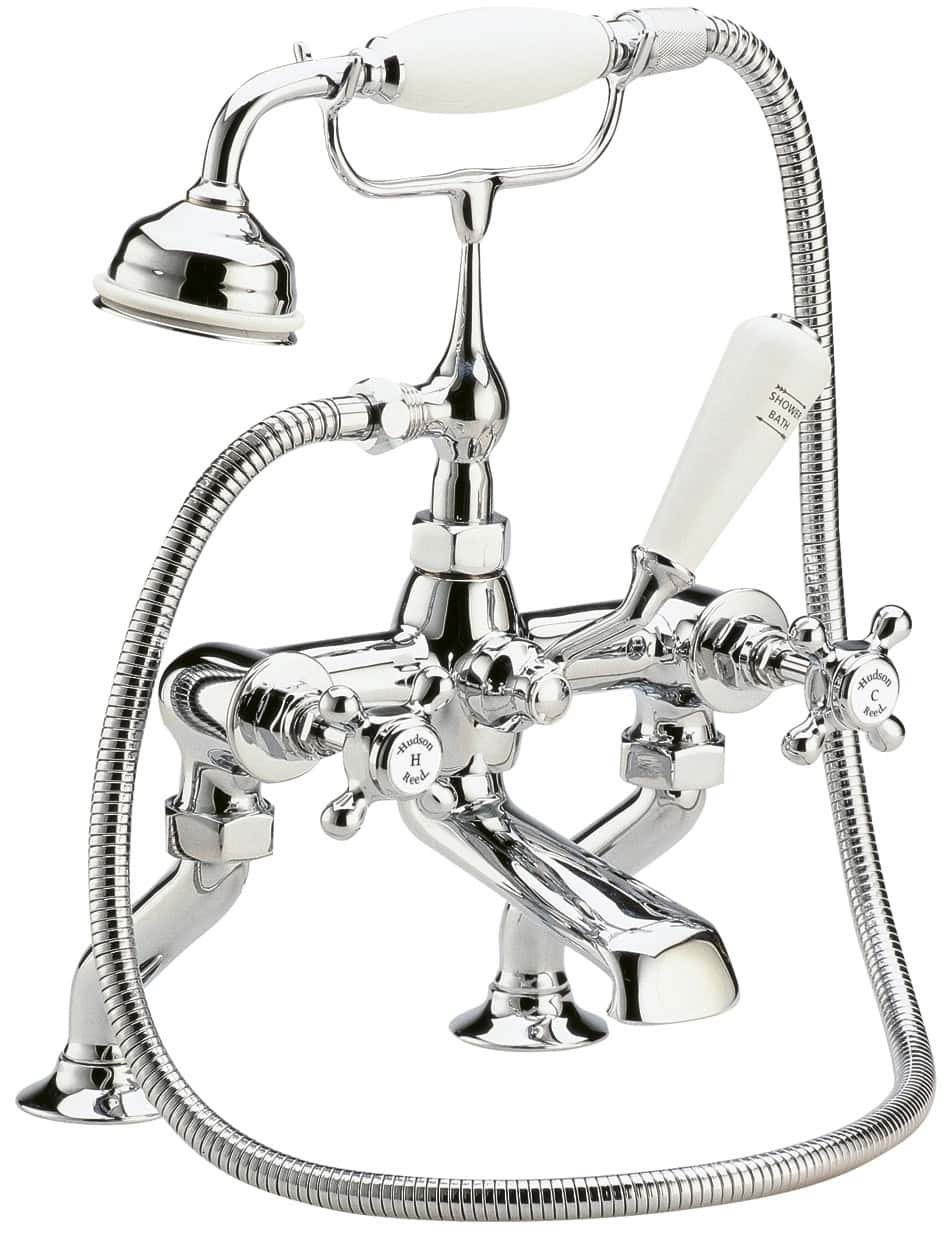Polished chrome vintage style bath shower mixer tap with handheld shower head and flexible hose, suitable for traditional bathroom settings.