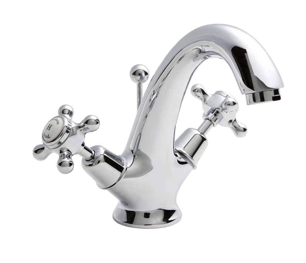 Chrome bathroom tap with dual handles, traditional design, polished finish, suitable for classic or vintage bathroom decor.