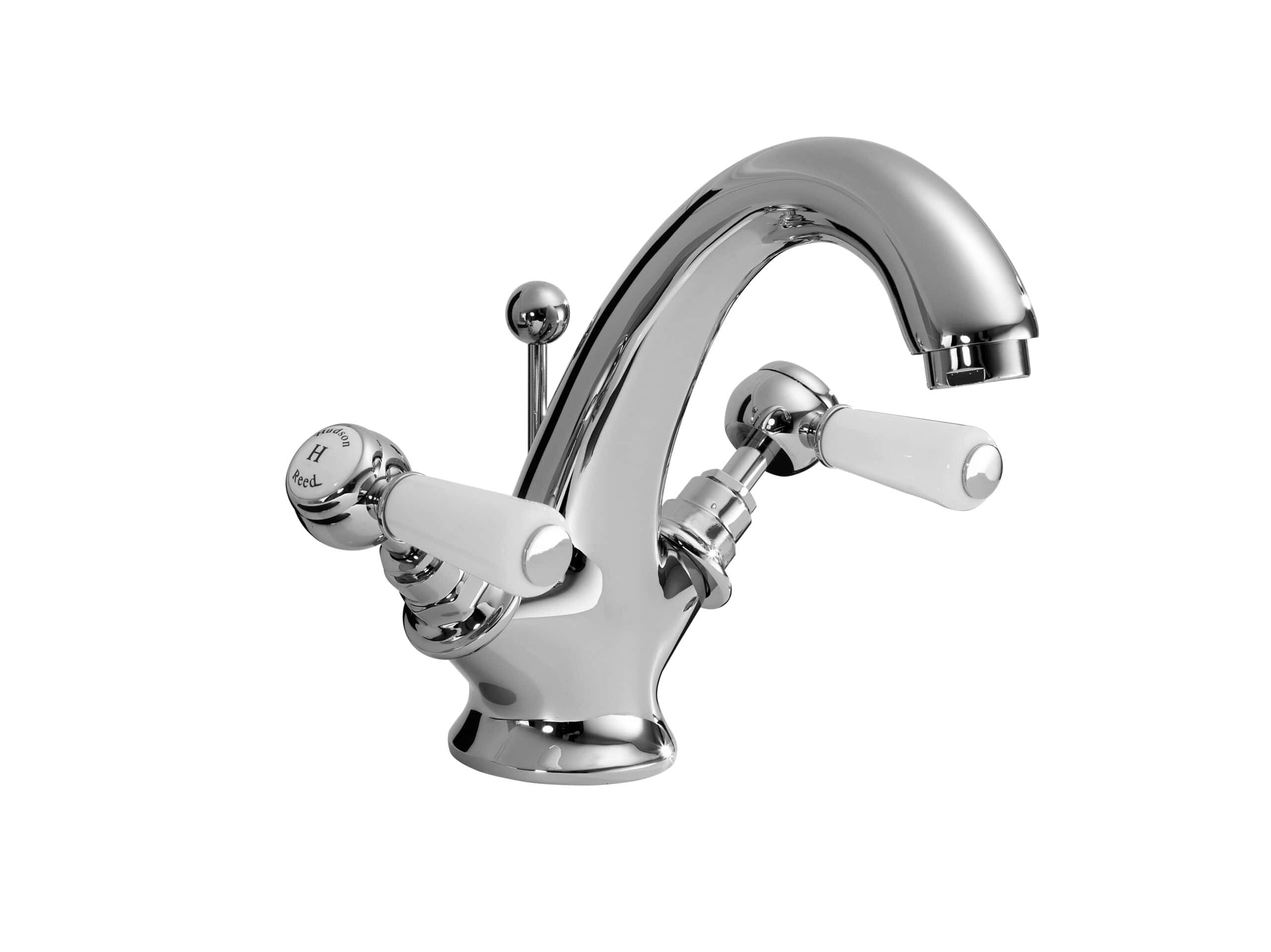 Chrome bathroom tap with white ceramic handles, modern and stylish design for contemporary bathrooms. Perfect for kitchen sinks and washbasins, durable and easy to operate.