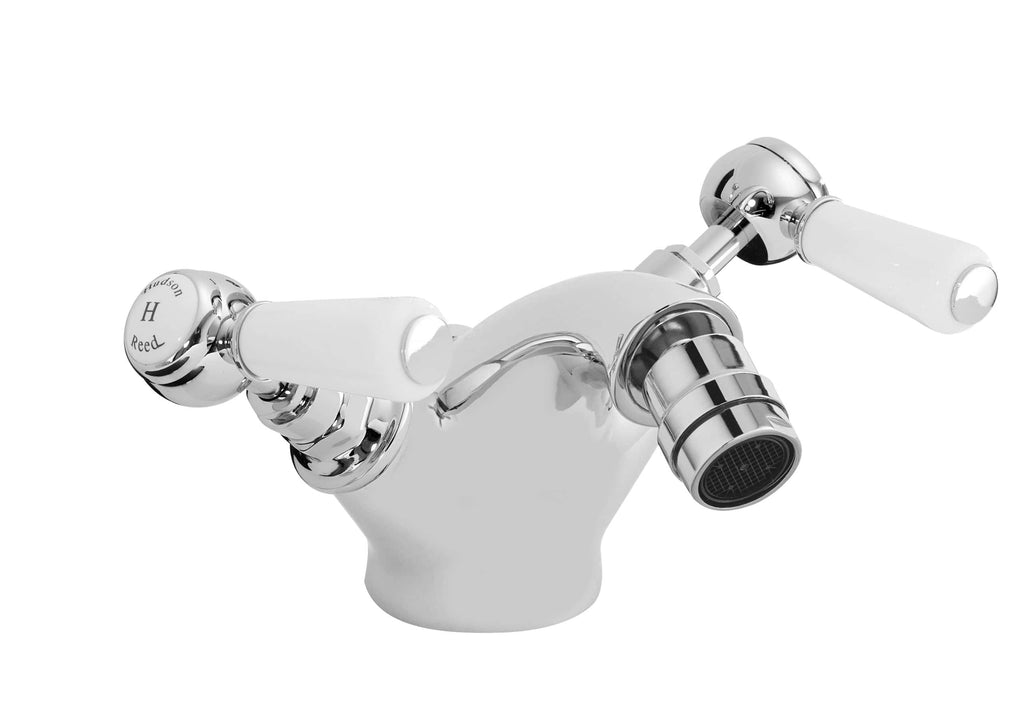 Chrome bathroom mixer tap with white ceramic handles, thermostatic control, and modern design – ideal for stylish Bubly Bathrooms installations.