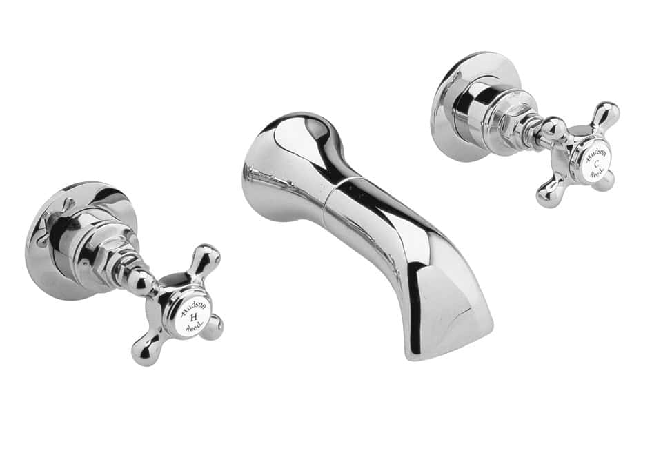 Elegant chrome bathroom tap with separate hot and cold handles, perfect for classic bathroom decor and high-quality bathroom fittings.