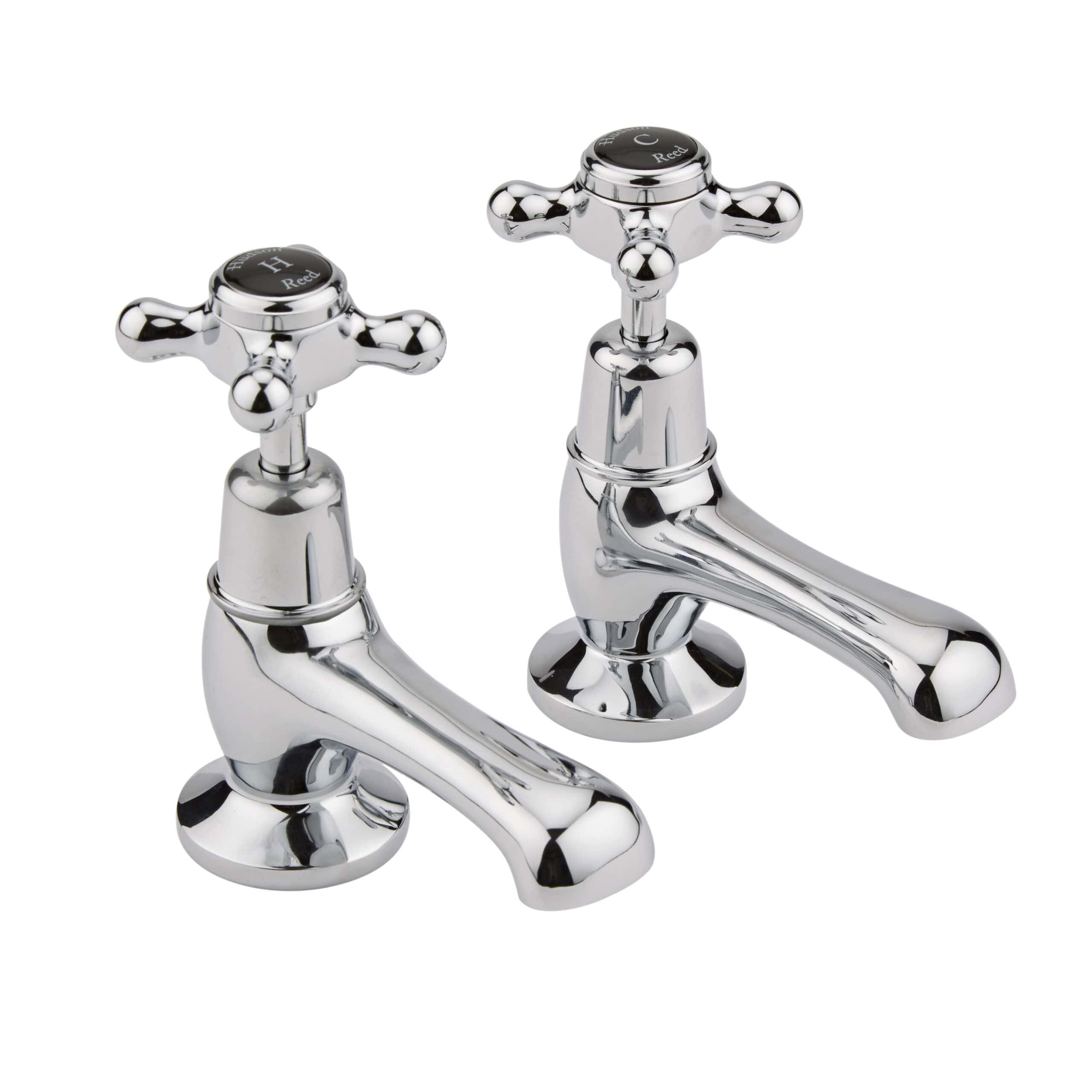 Polished chrome bathroom sink taps with cross handles and vintage style design. Ideal for traditional and classic bathroom settings. Durable and easy to operate.